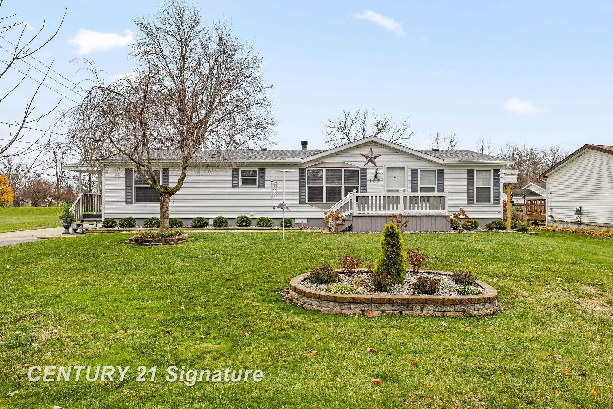 126 E Maple Street, Saint Charles, MI 48655 — front exterior