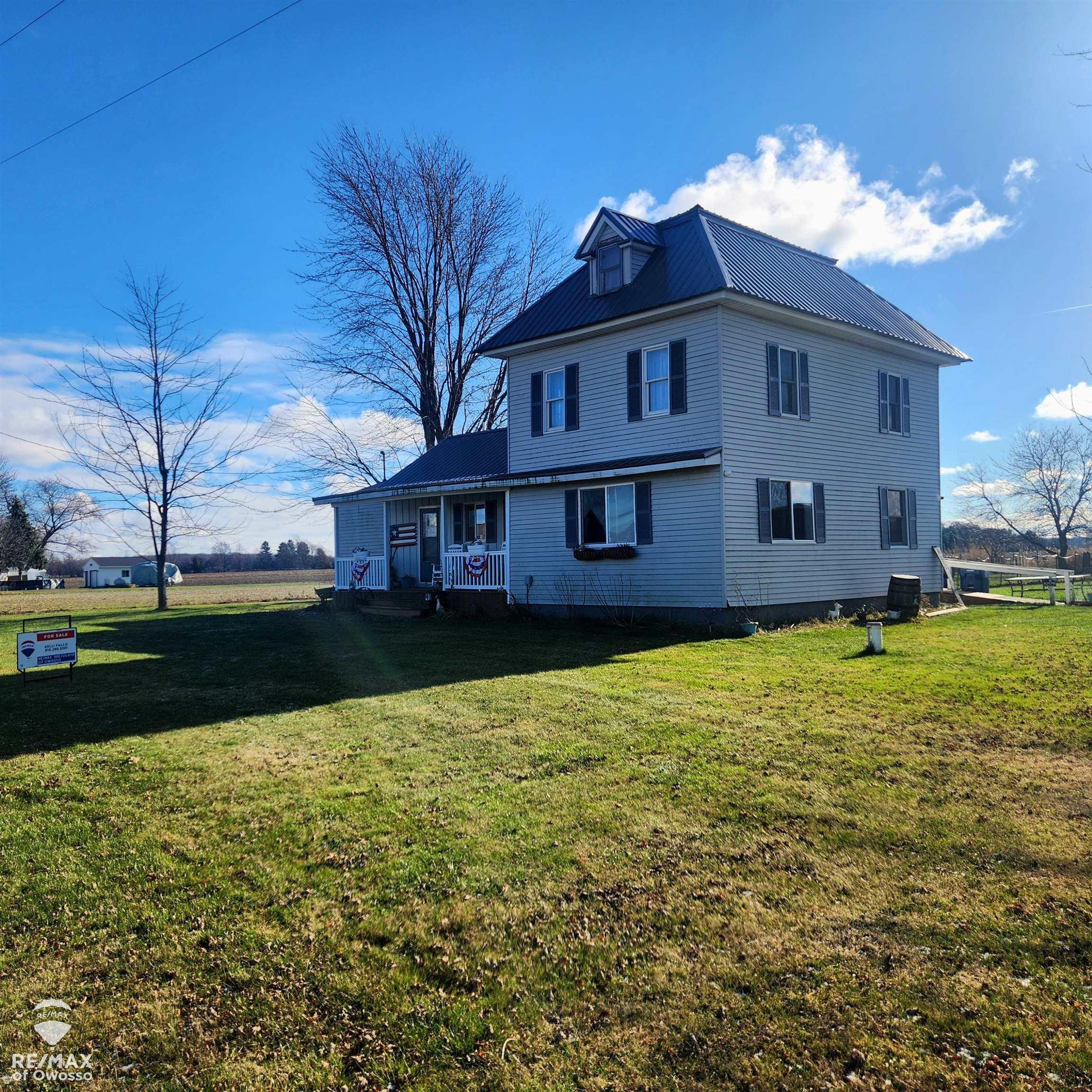 8585 Volkmer Road, Chesaning, MI 48616 — front exterior