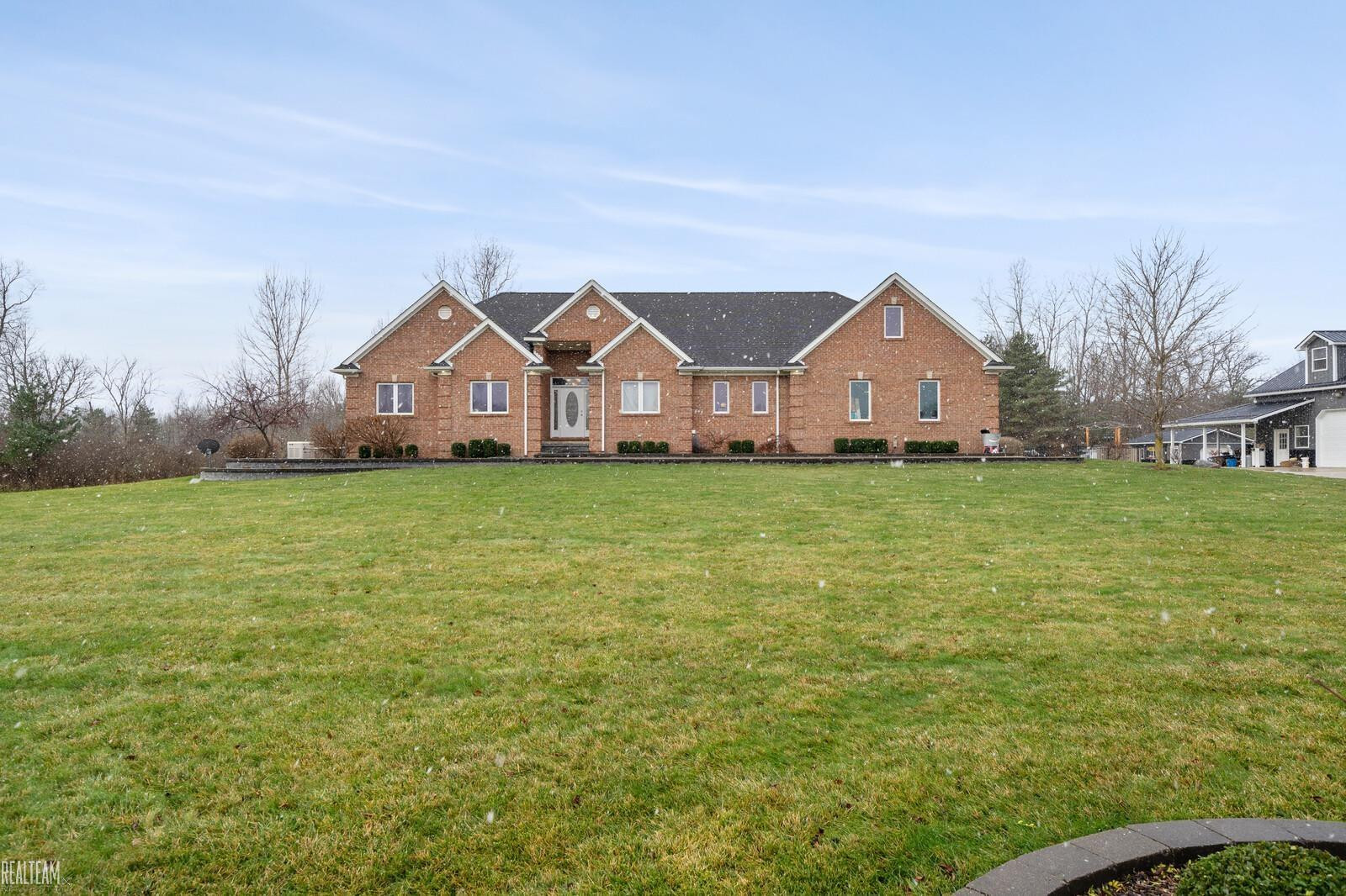 4135 Shamrock Road, Emmett, MI 48022 — front exterior