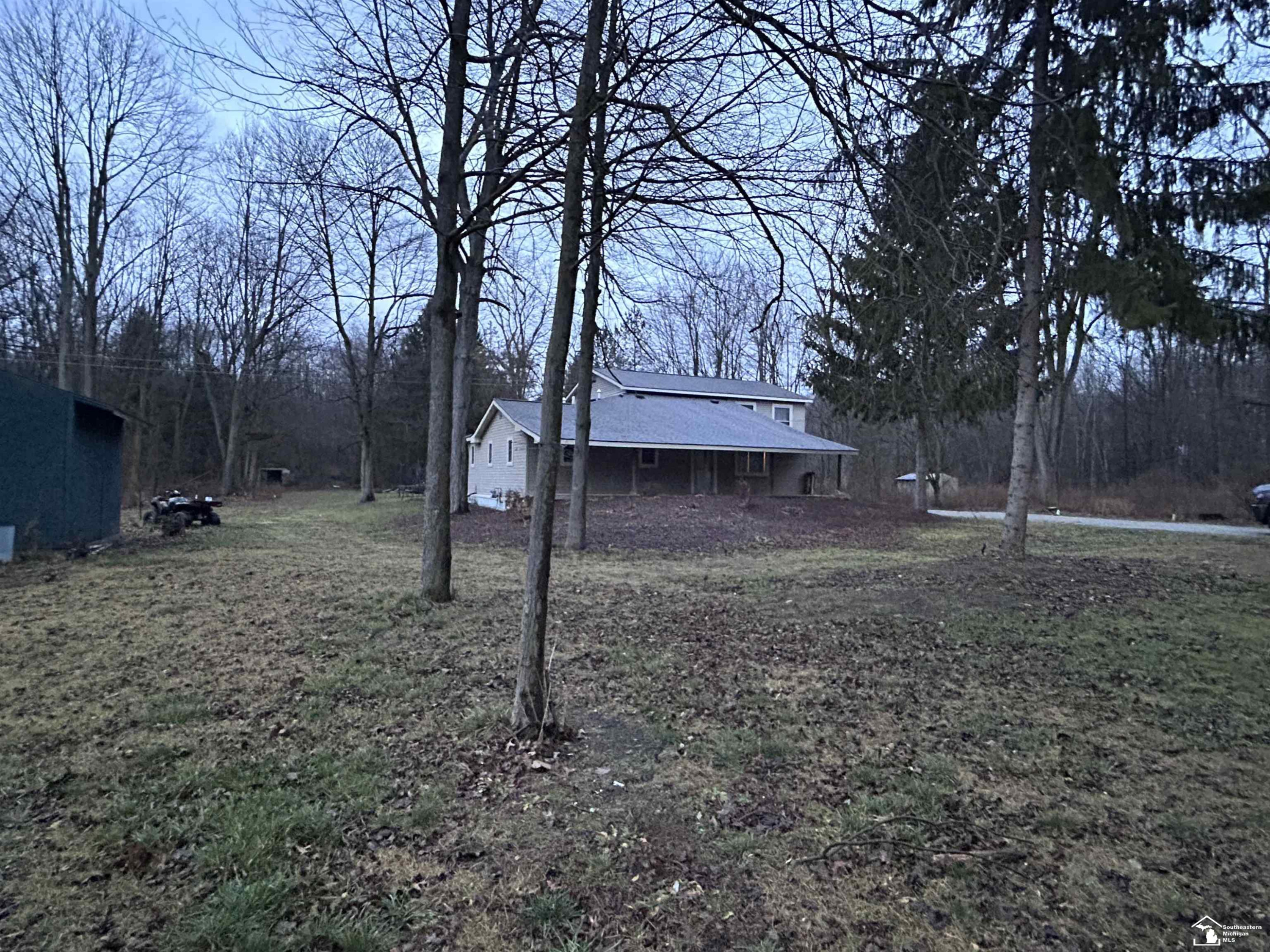 9665 Tuttlehill Rd, Maybee, MI — front exterior