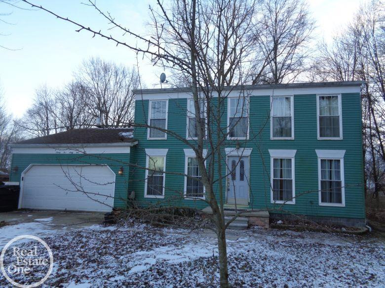 9565 Short Cut Road, MI — front exterior