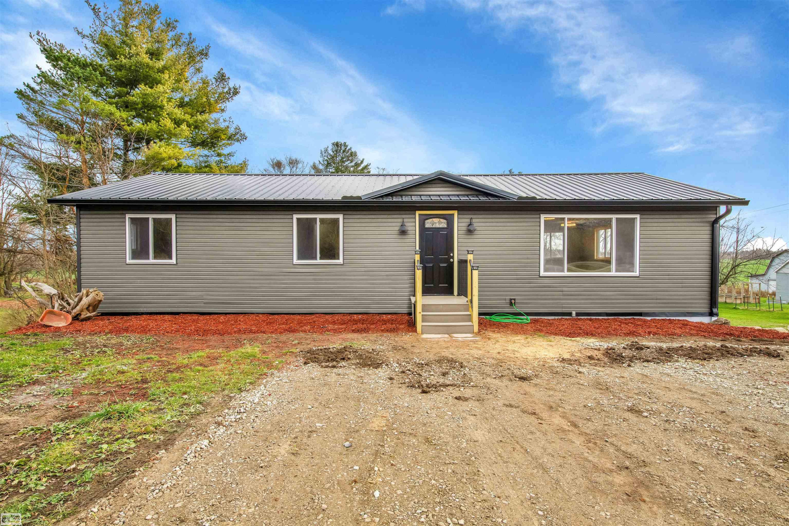 704 N Van Dyke Road, Imlay City, MI 48444 — front exterior
