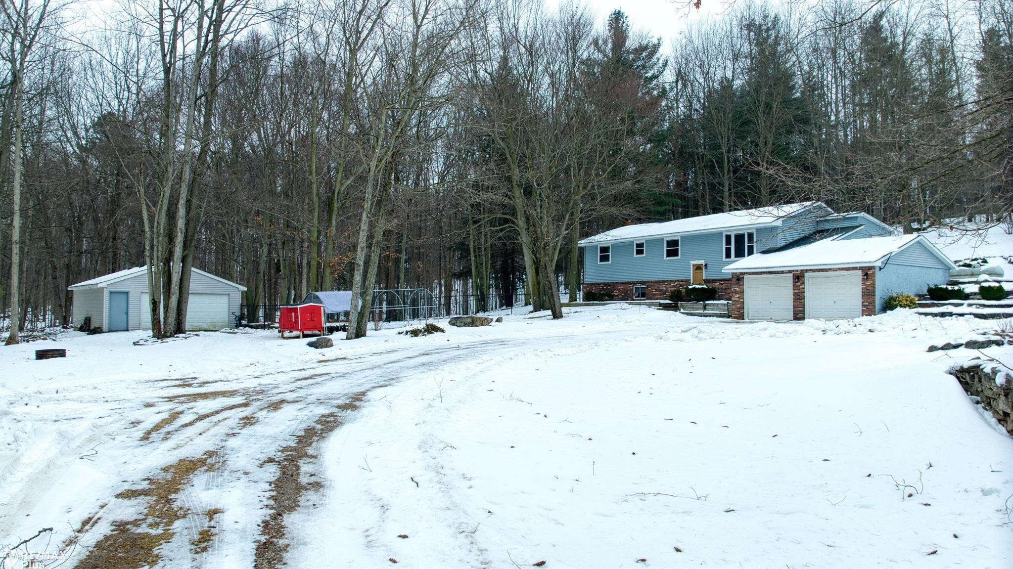 6156 Willits Road, Fostoria, MI 48435 — front exterior