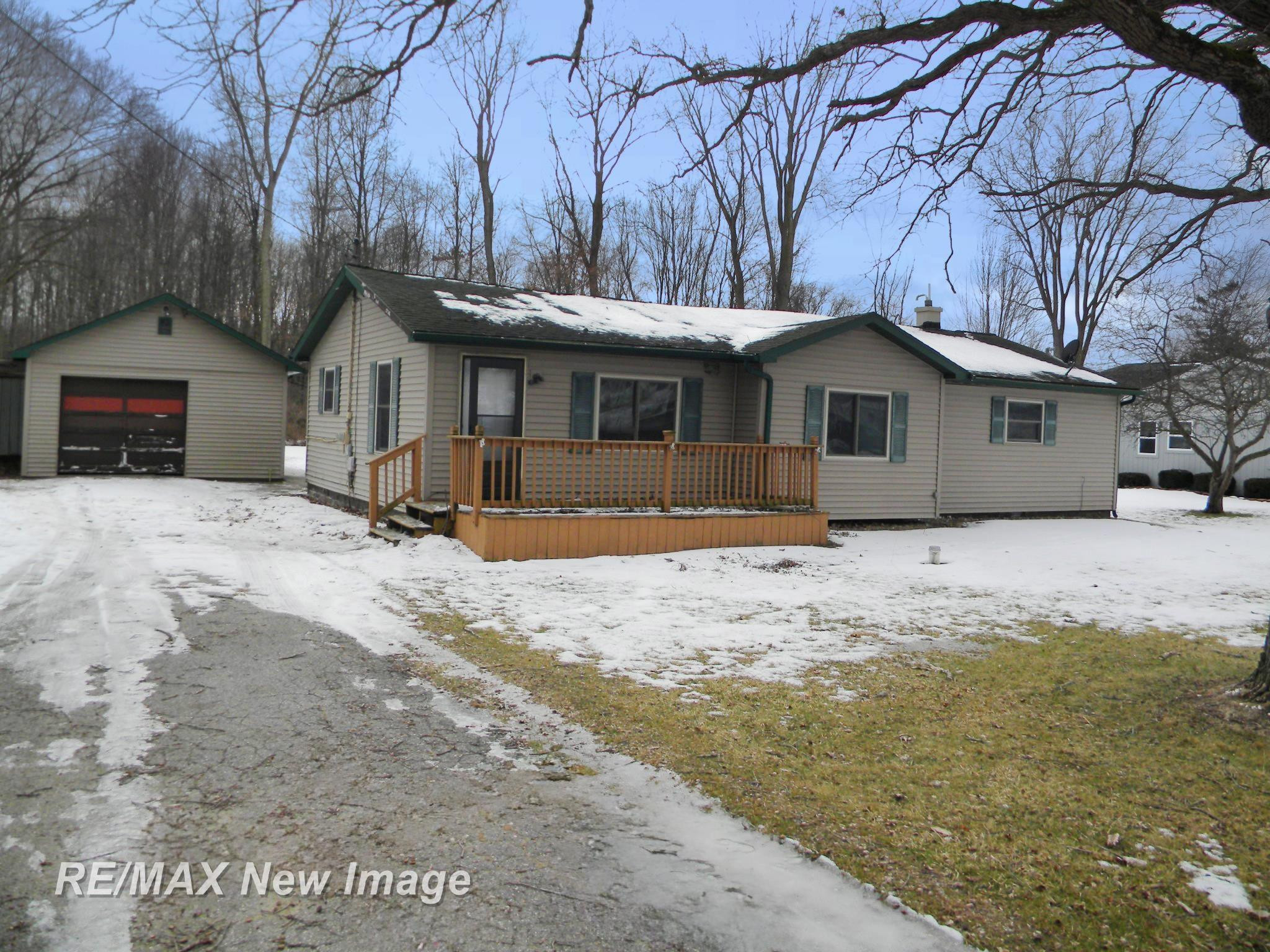 1104 E Burt Road, Burt, MI 48417 — front exterior