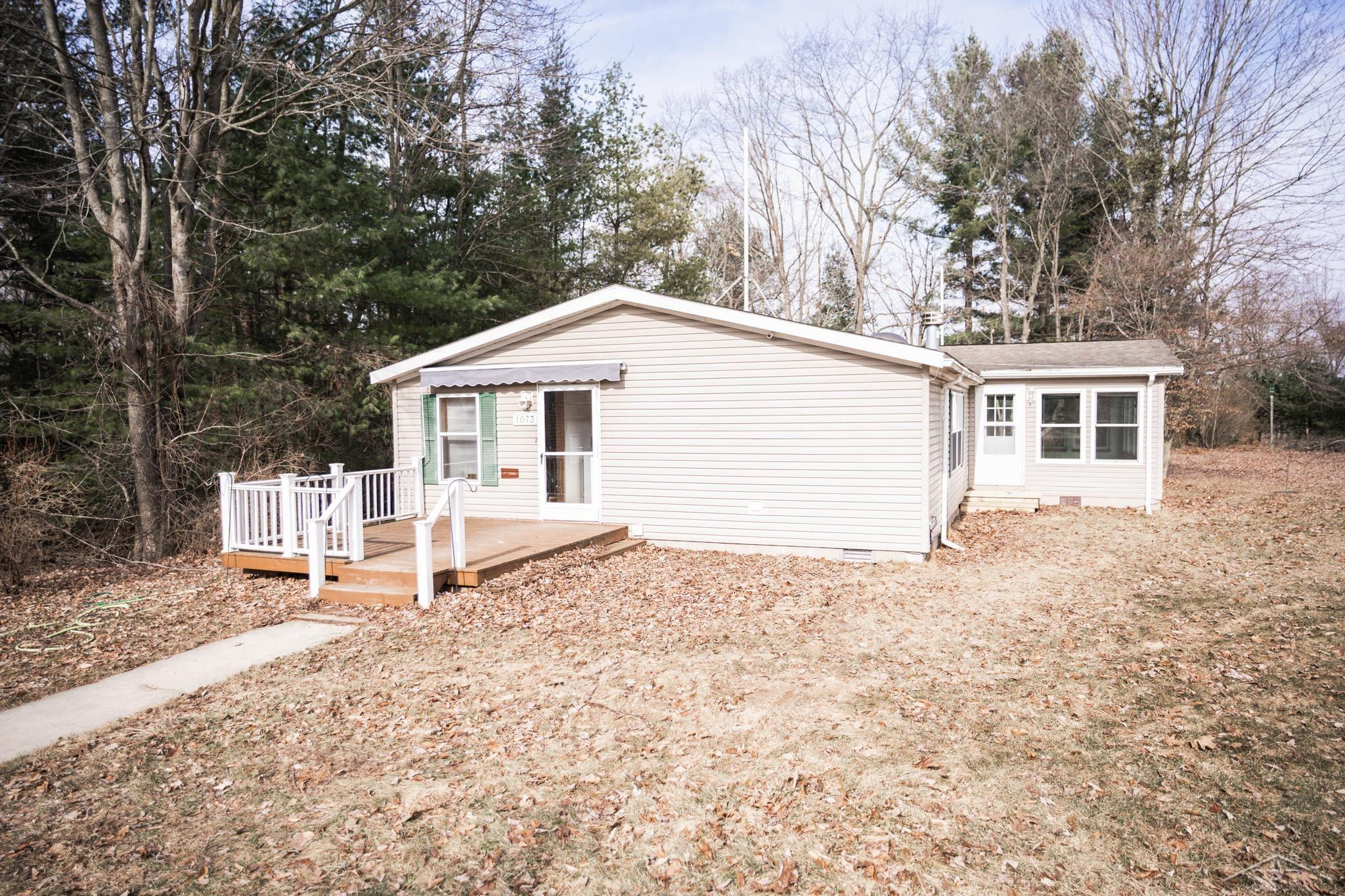 1073 Carmen Drive, Weidman, MI 48893 — Photo 2