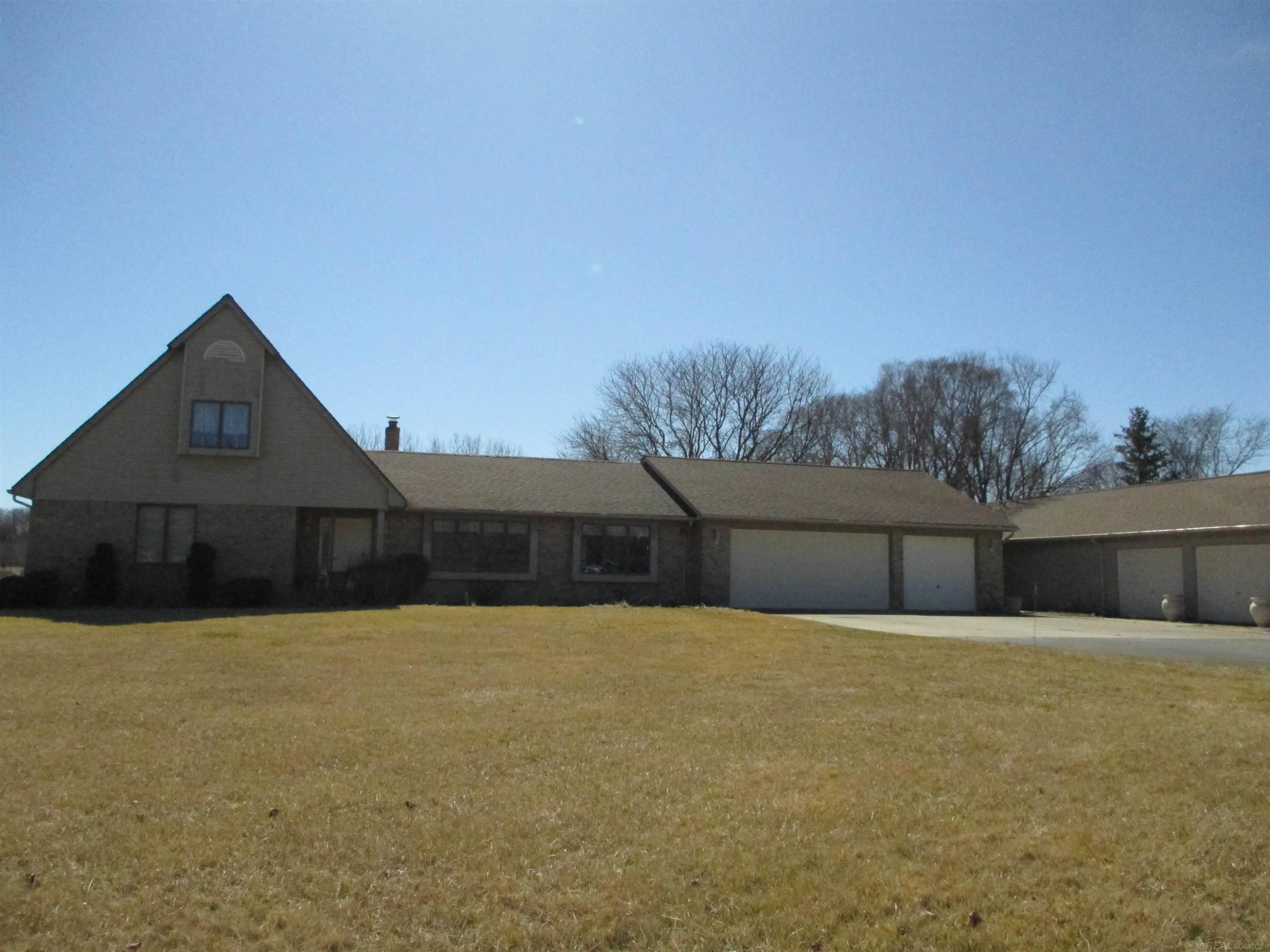 18990 28 Mile Road, MI — front exterior
