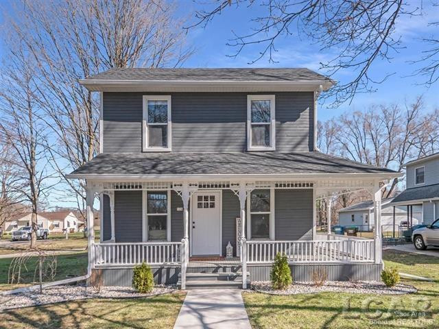 124 Loomis Street, MI 49236 — front exterior