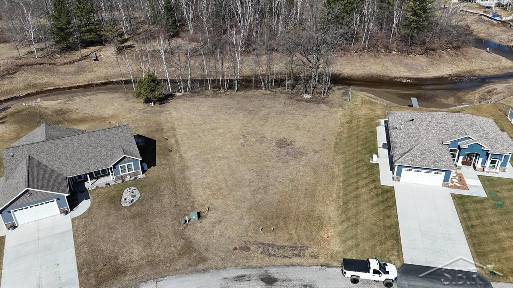 863 E Shoreline Drive, Hope, MI 48628 — front exterior