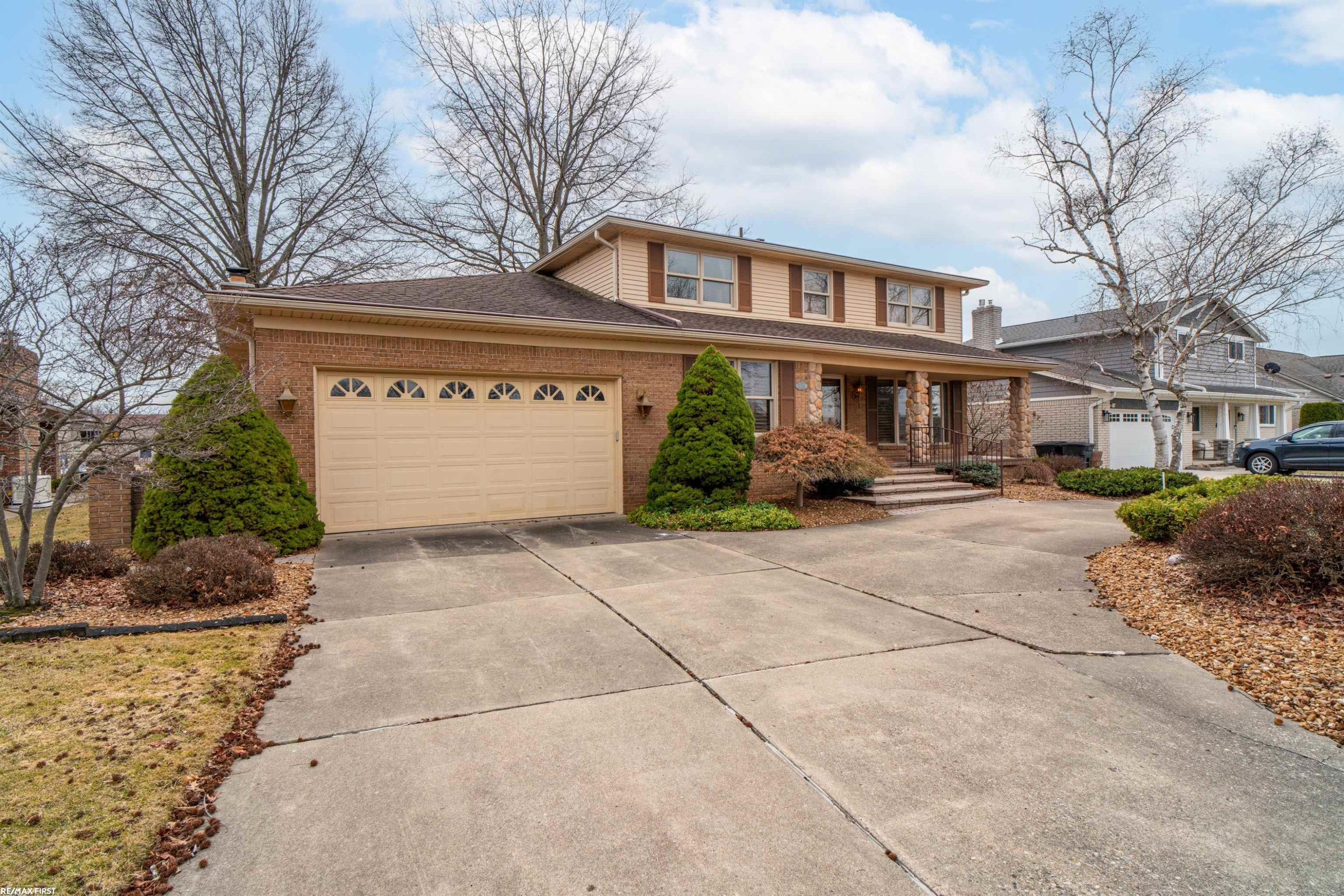 49654 Regatta Drive, Chesterfield, MI 48047 — front exterior