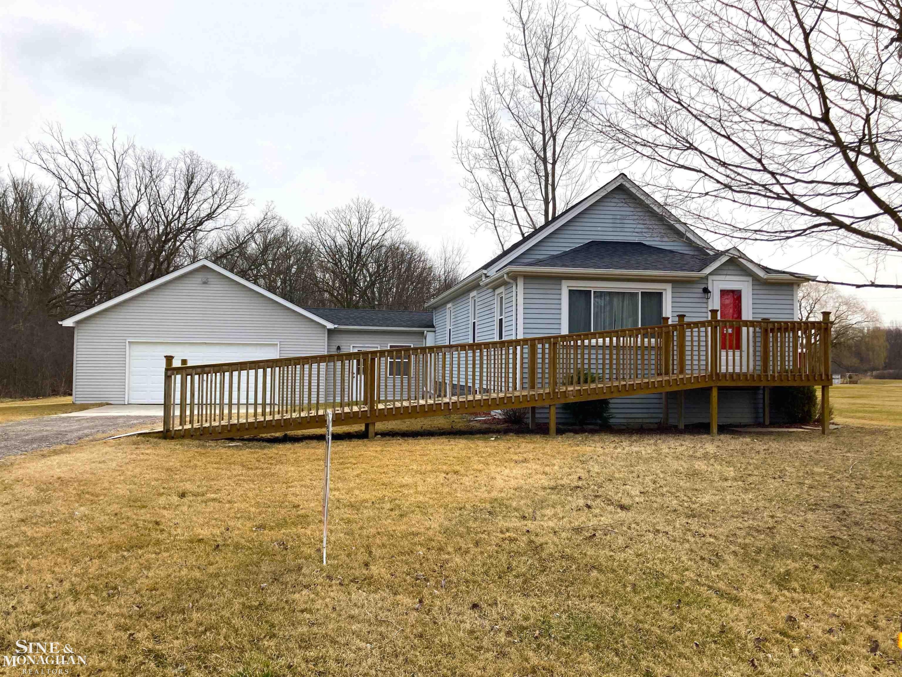 5301 Marsh Road, MI — front exterior