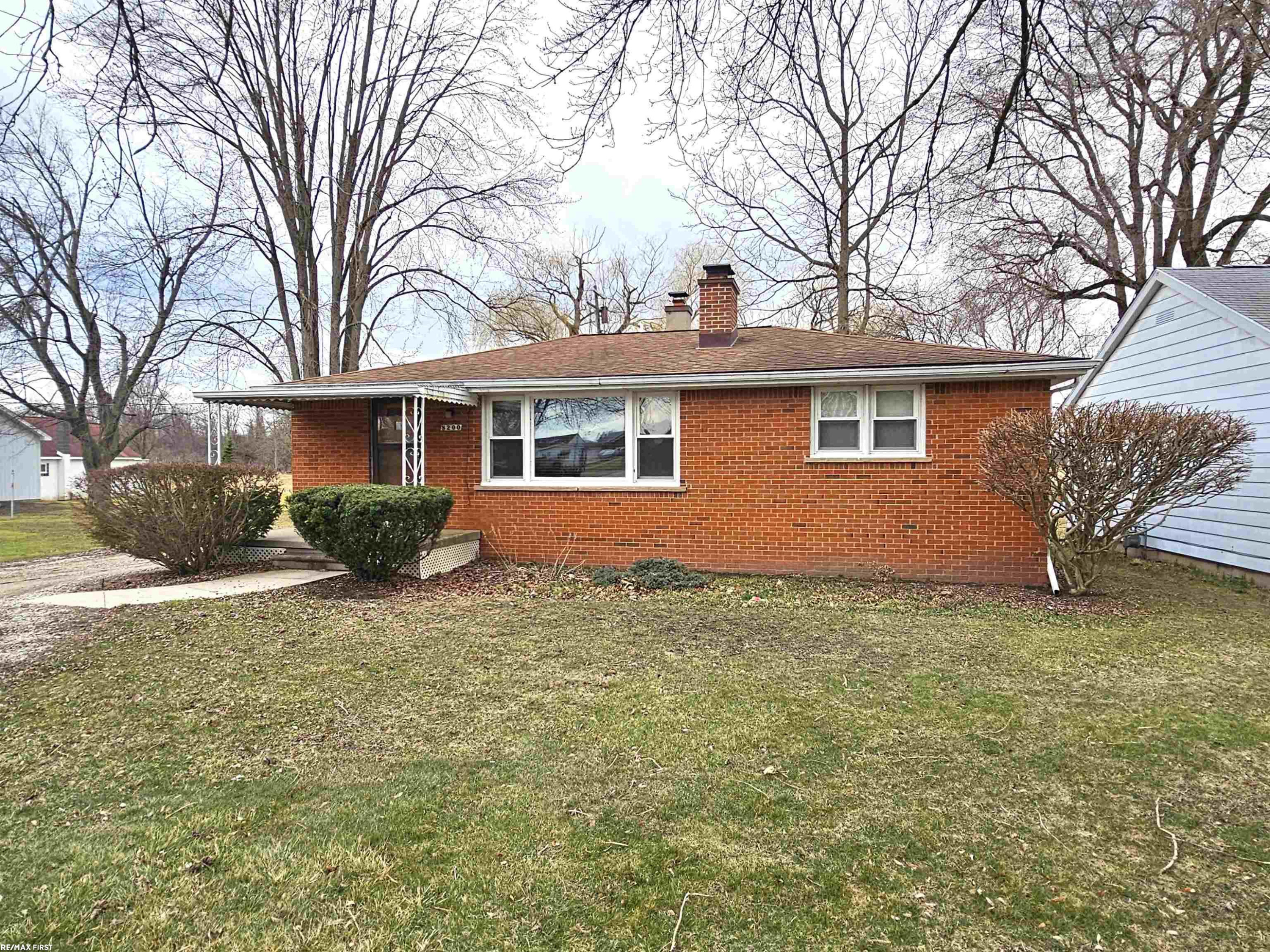8200 S River Road, MI — front exterior