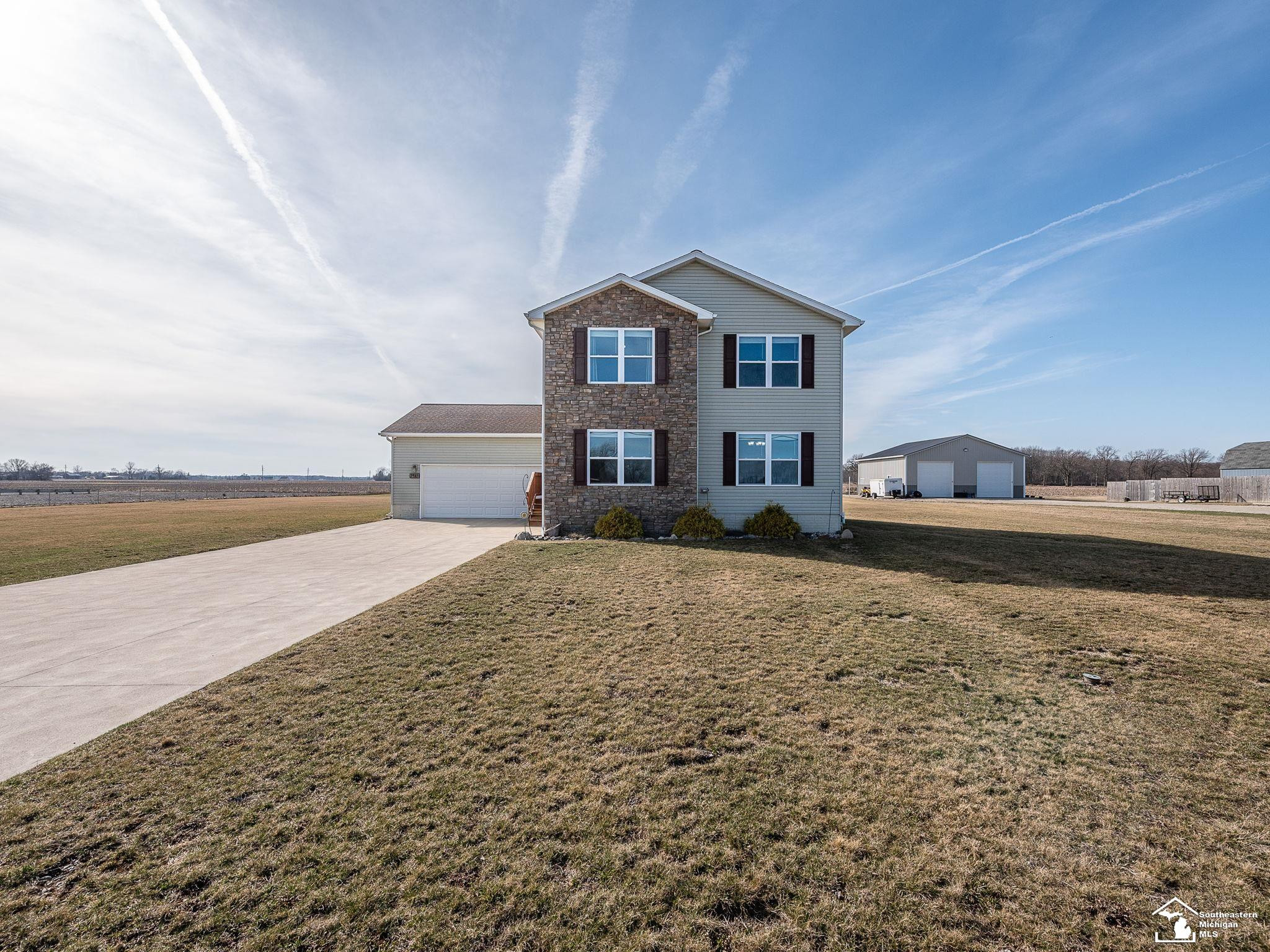 9489 Raisin Street, Maybee, MI — front exterior