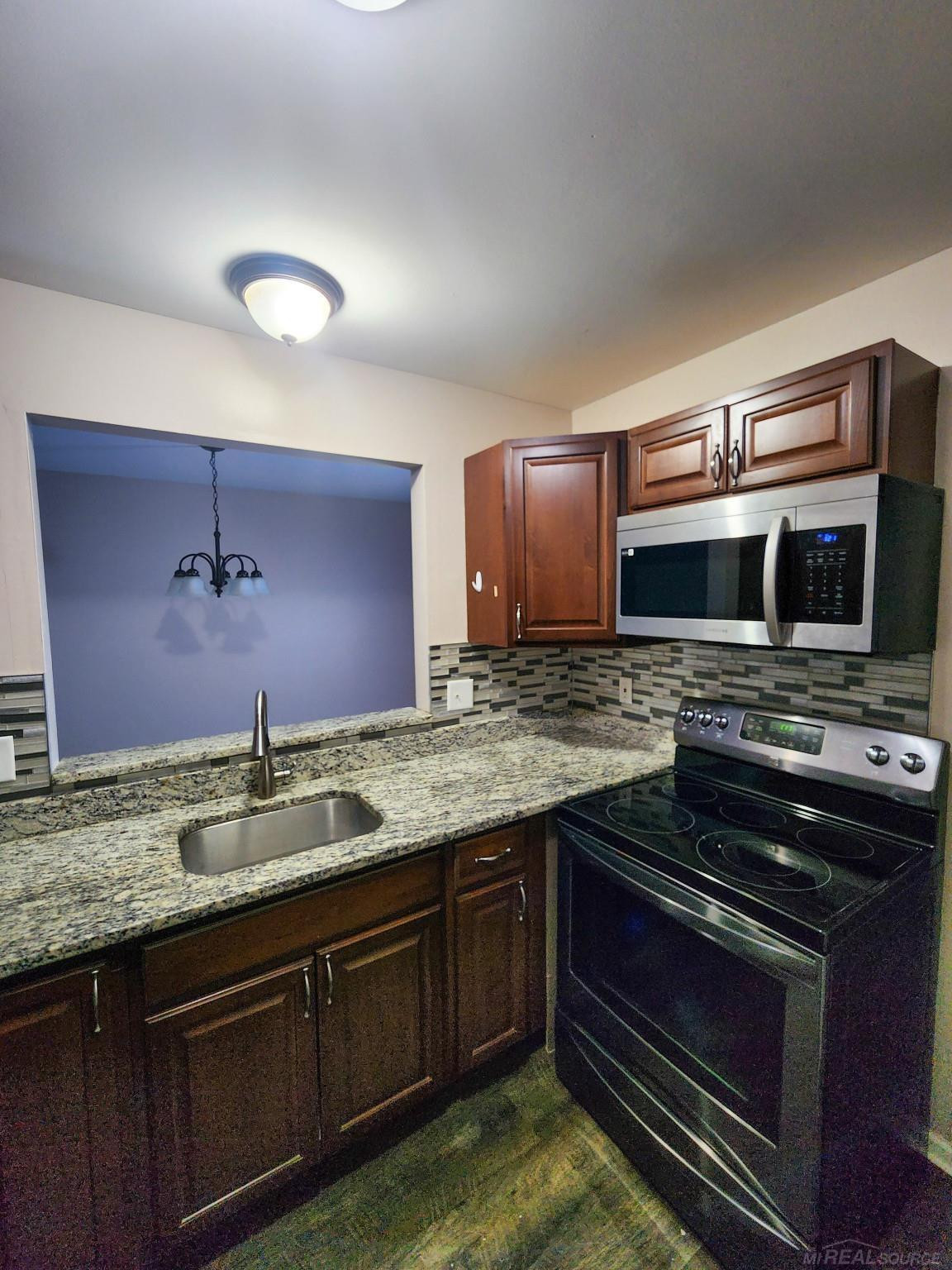 220 Oakbrooke Drive, 2, Lyons, MI 48178 — Photo 2