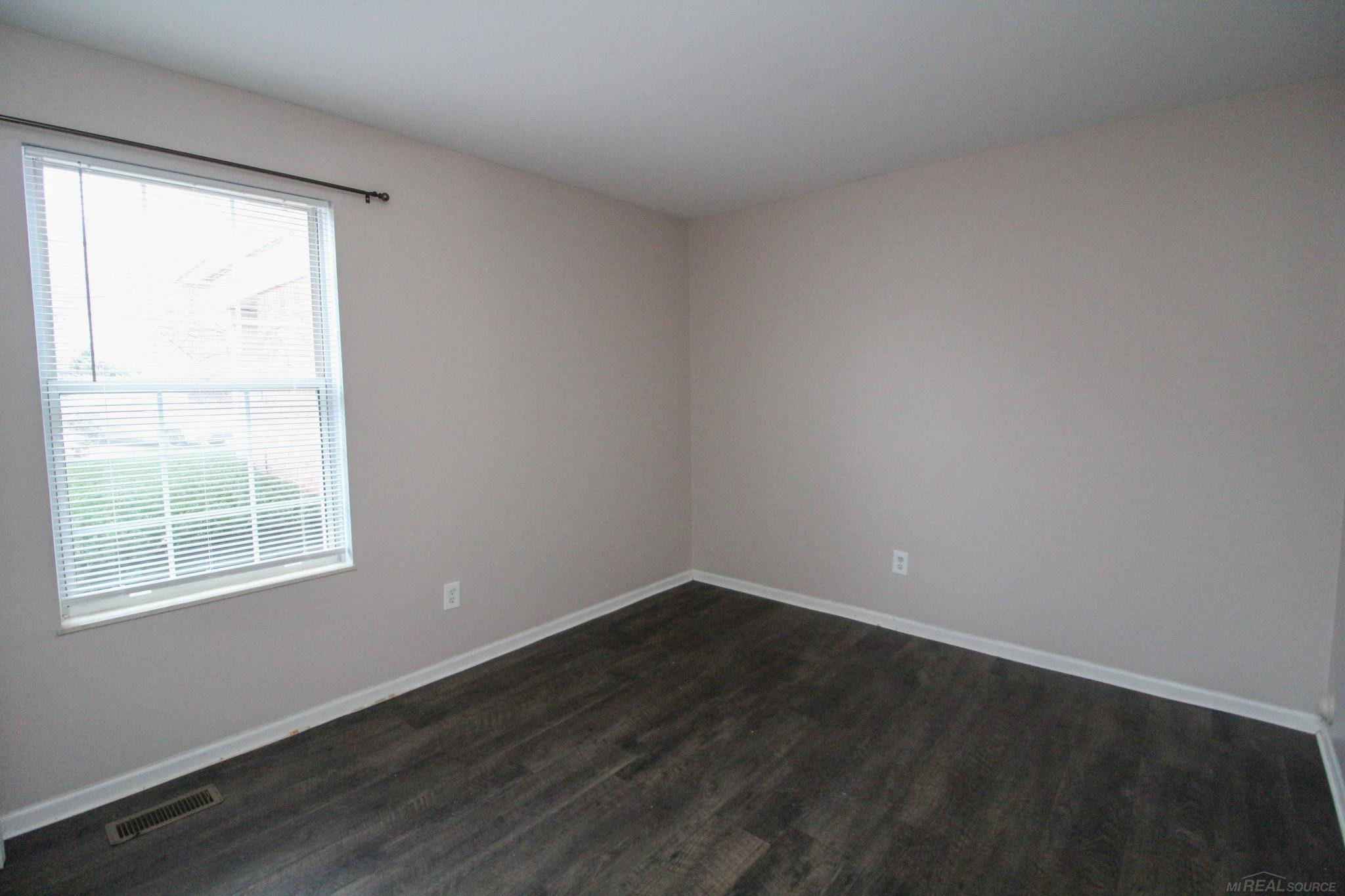 220 Oakbrooke Drive, 2, Lyons, MI 48178 — Photo 13