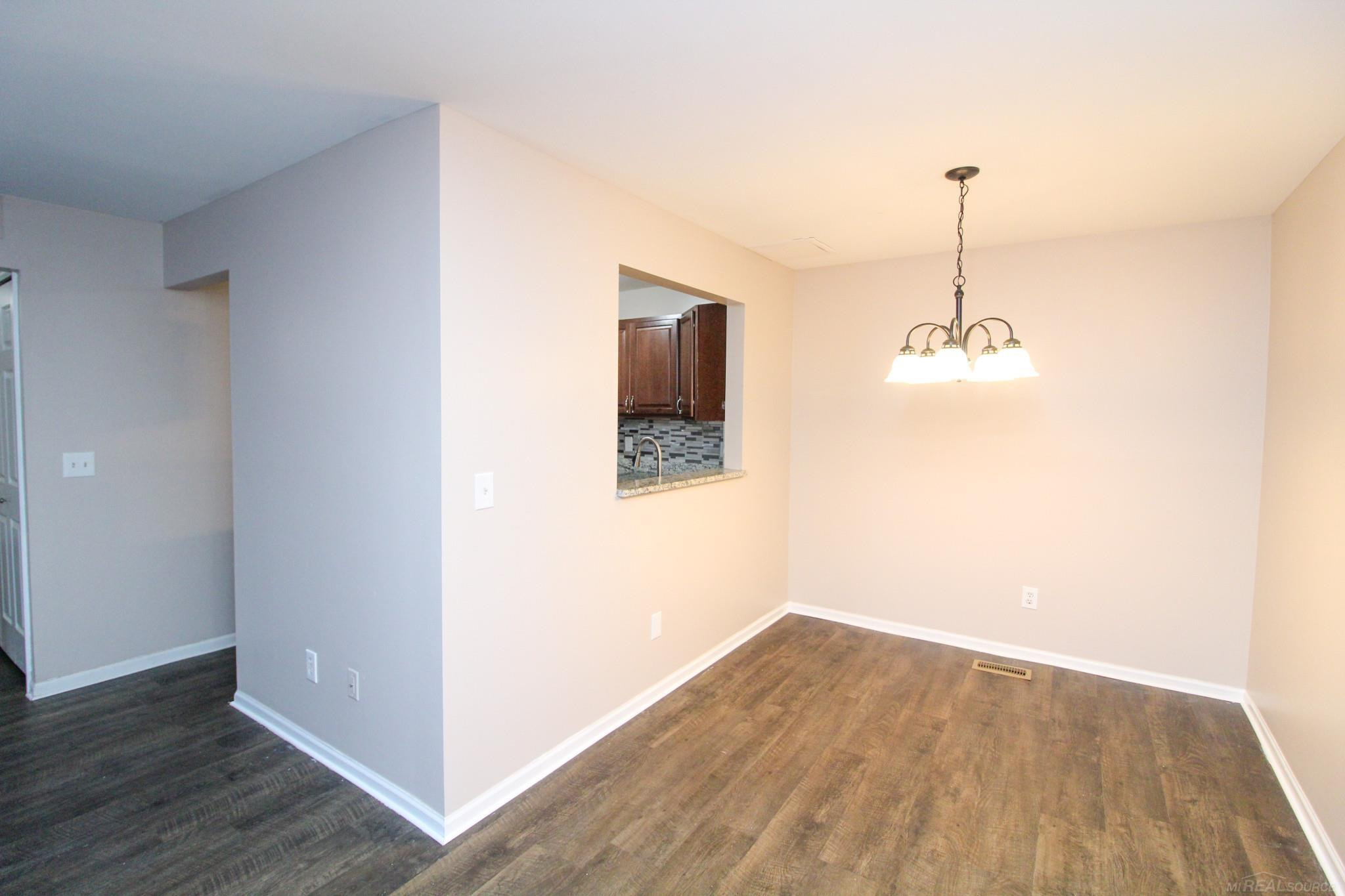 220 Oakbrooke Drive, 2, Lyons, MI 48178 — Photo 16