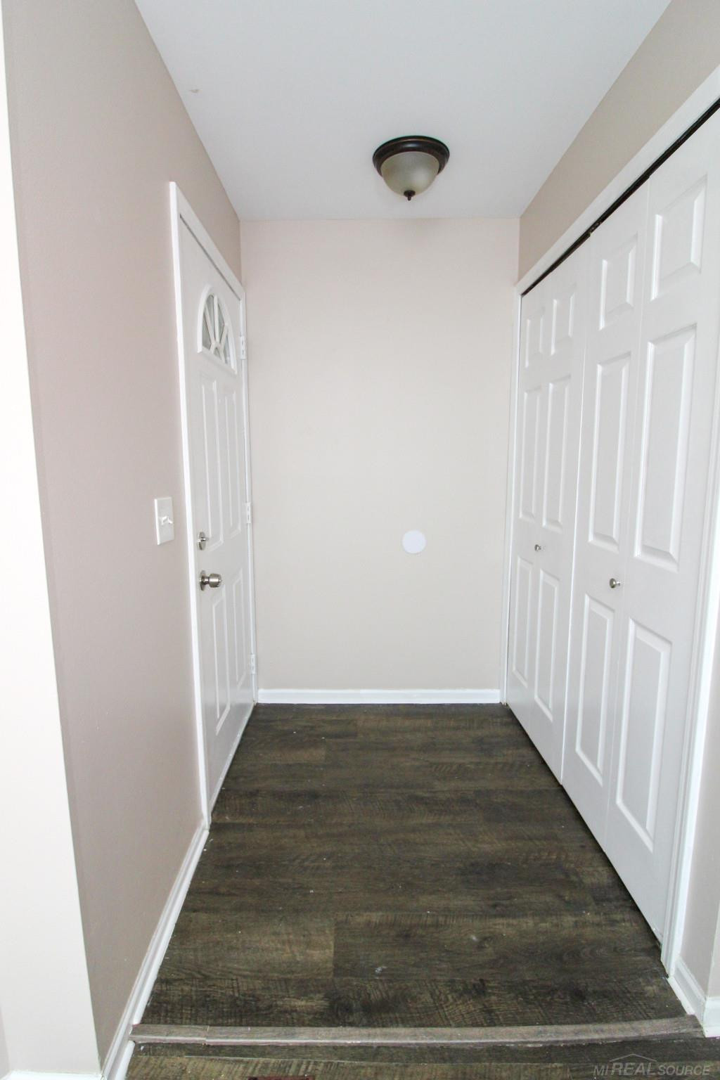 220 Oakbrooke Drive, 2, Lyons, MI 48178 — Photo 18