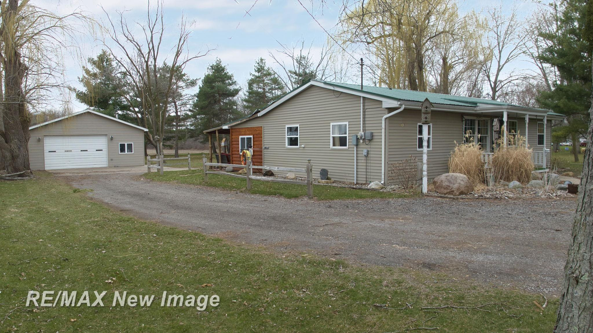 1435 W Fry Road, Burt, MI 48417 — front exterior