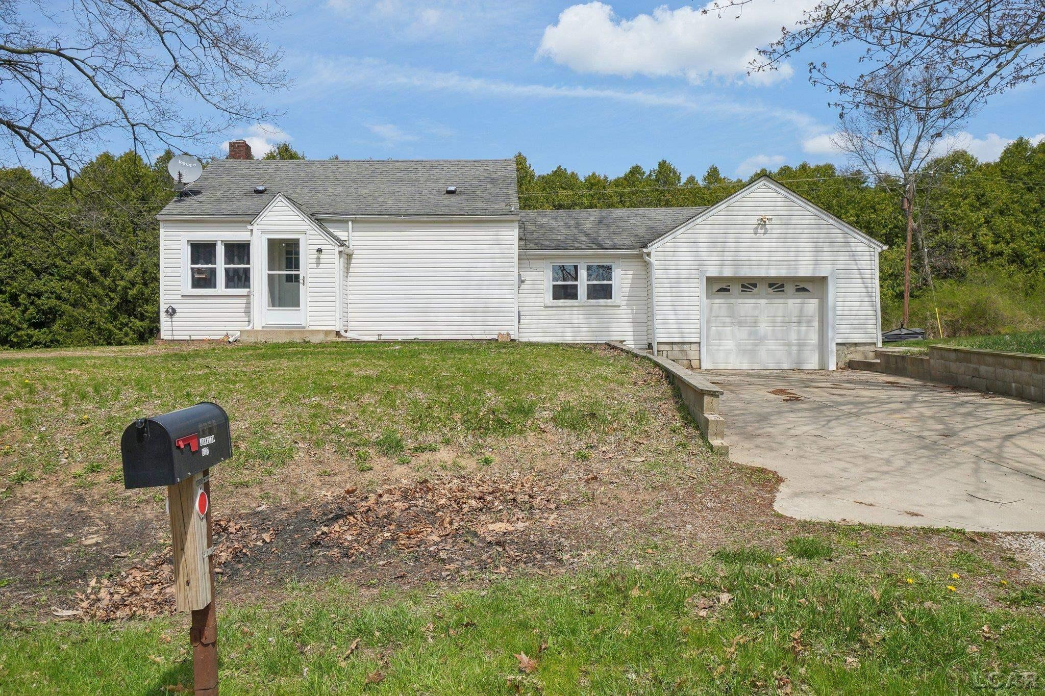 6112 Monroe Road, Tipton, MI 49287 — front exterior