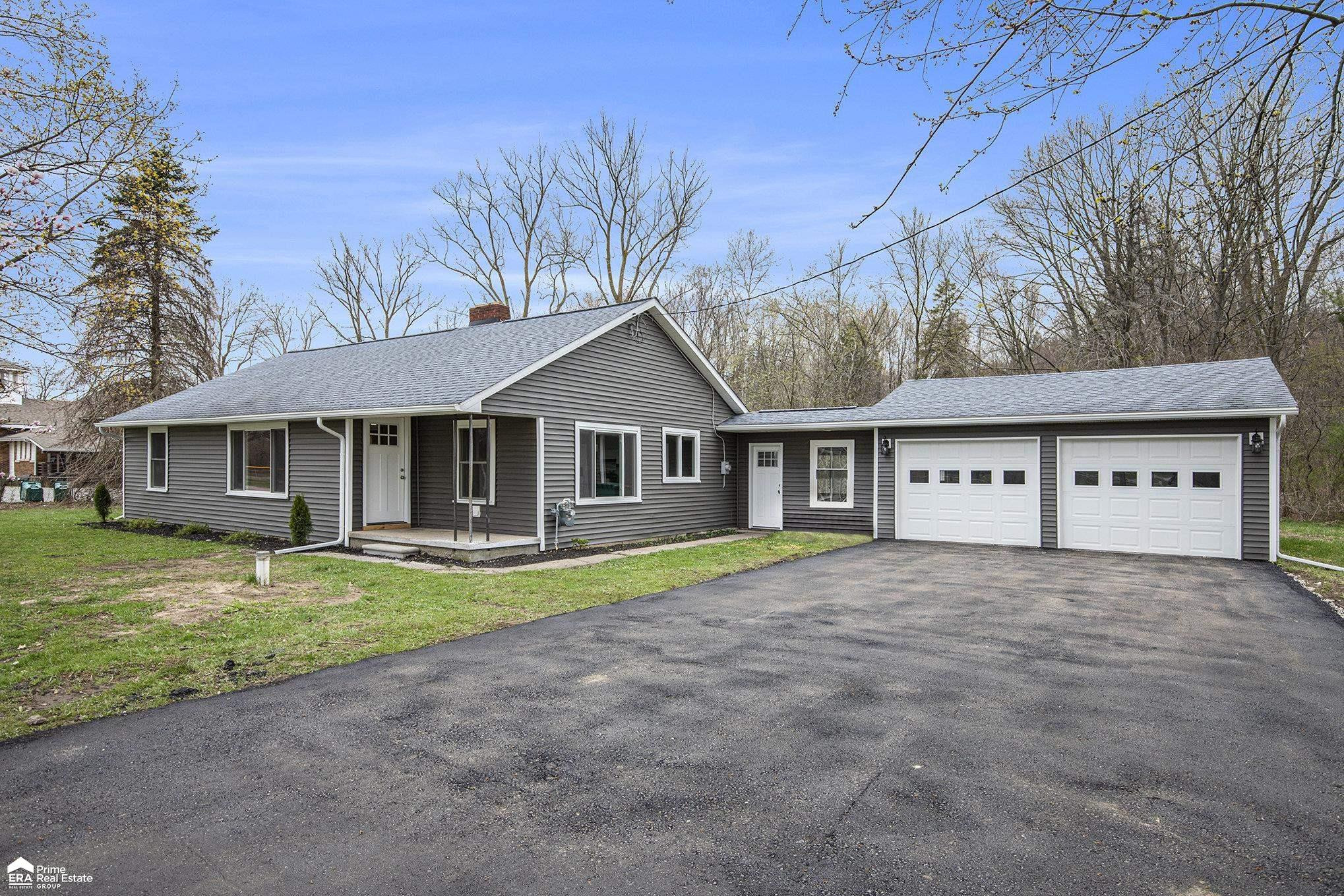 2395 E Burt Road, Burt, MI 48417 — front exterior