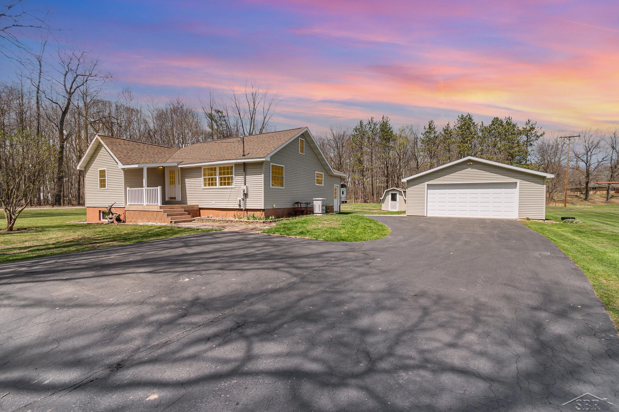 1183 E Stewart Road, Midland, MI 48640 — front exterior
