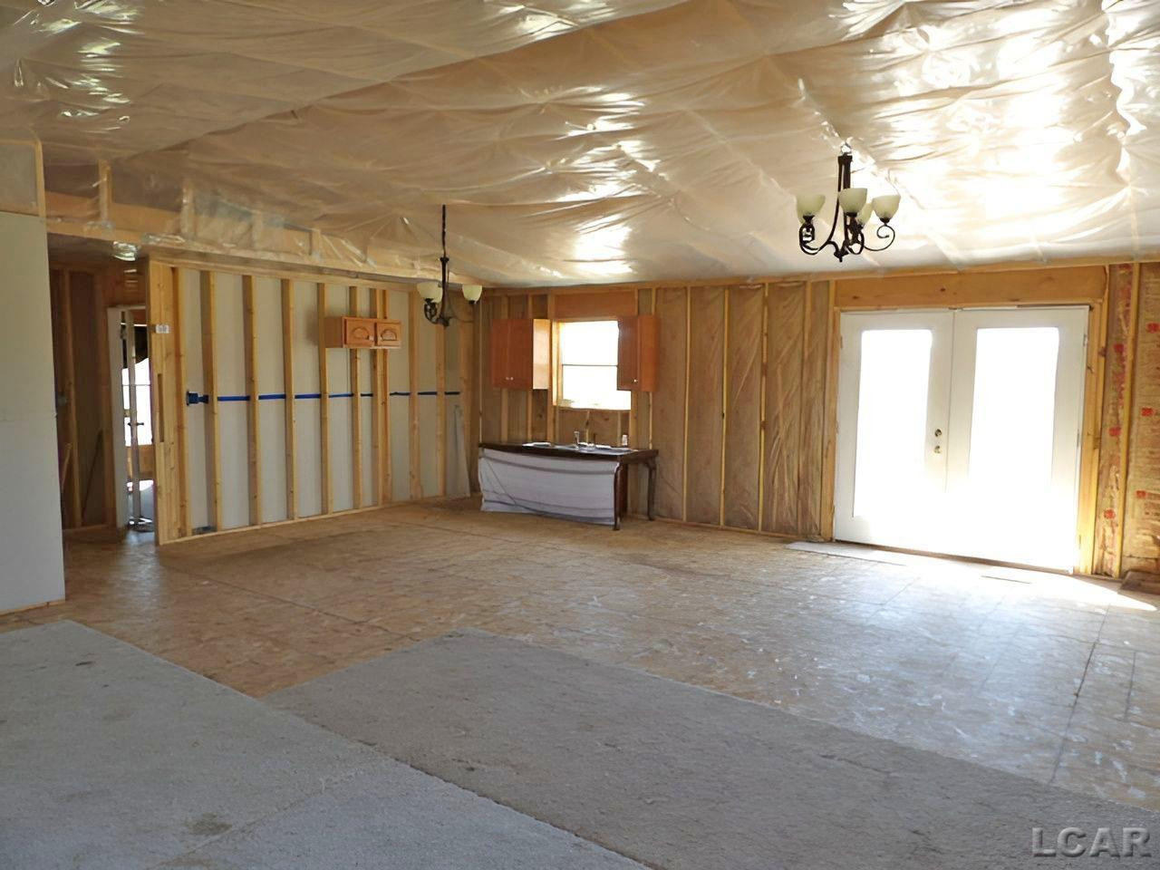 7640 S Lake Pleasant Road, Osseo, MI 49266 — Photo 4