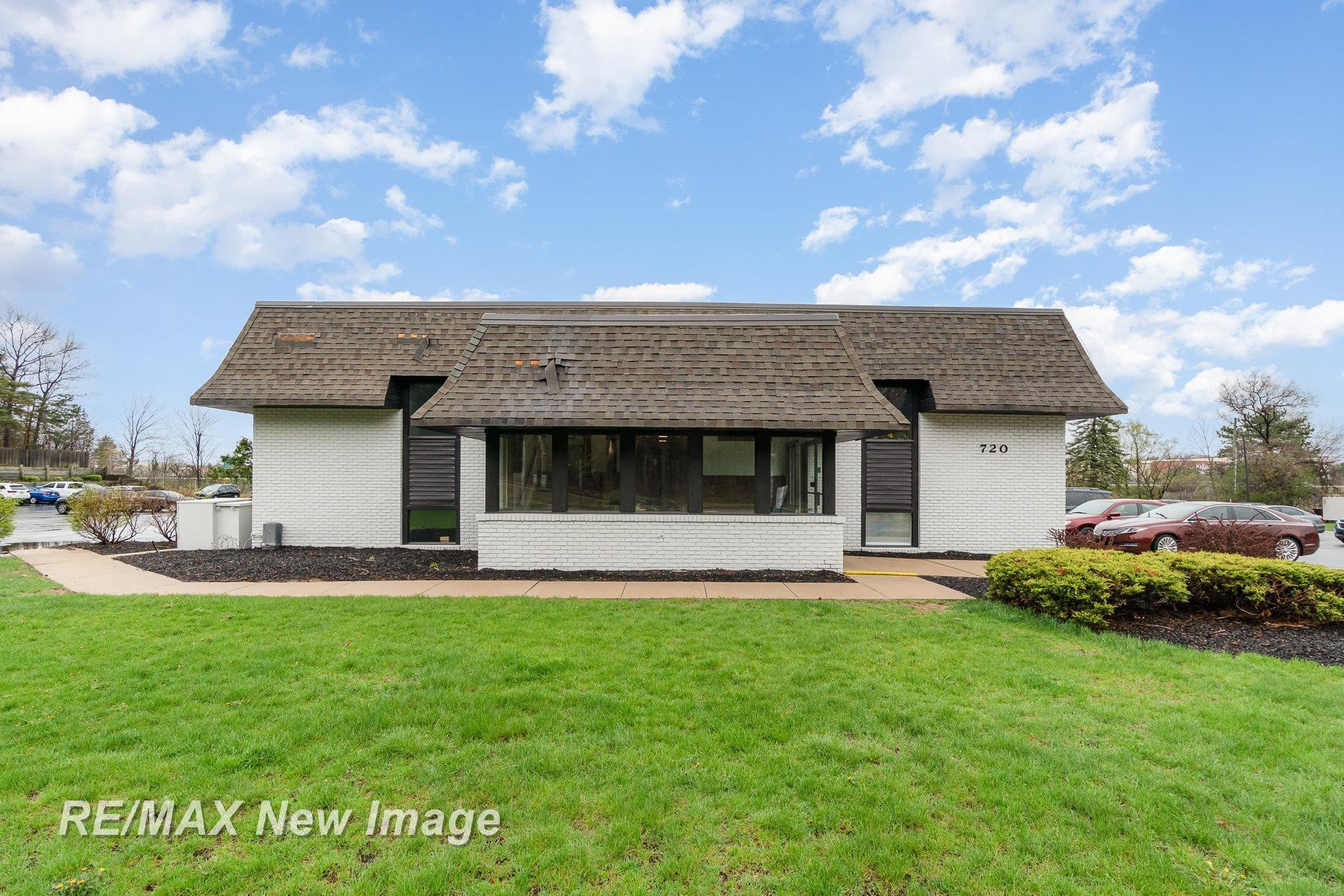 720 W WACKERLY Street, Midland, MI 48640 — front exterior