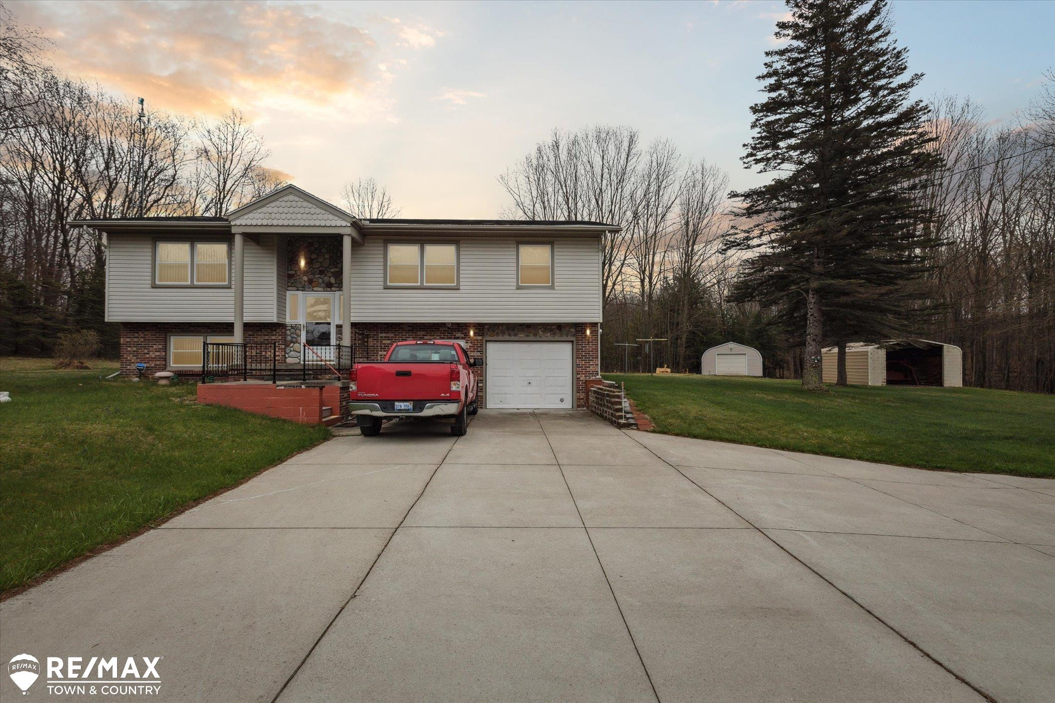 541 Stockwell Road, Harrison, MI 48625 — front exterior