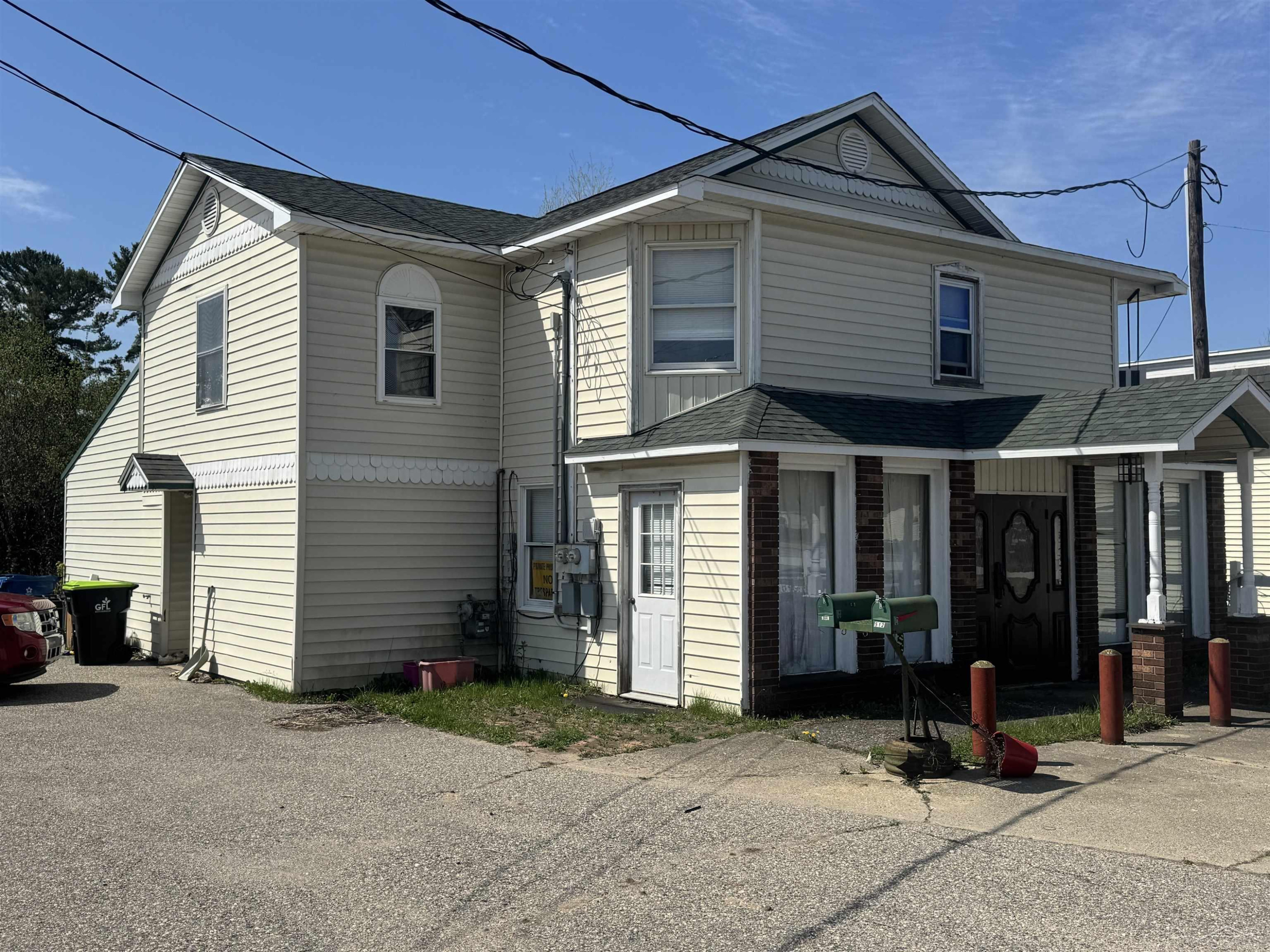 512 E Houghton Avenue, West Branch, MI 48661 — front exterior