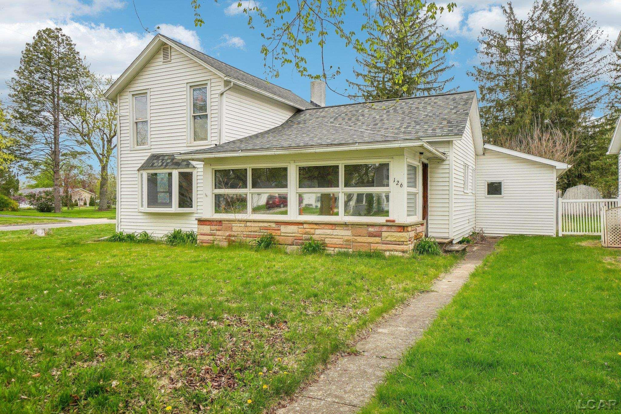 126 Litchfield Street, MI 49236 — front exterior