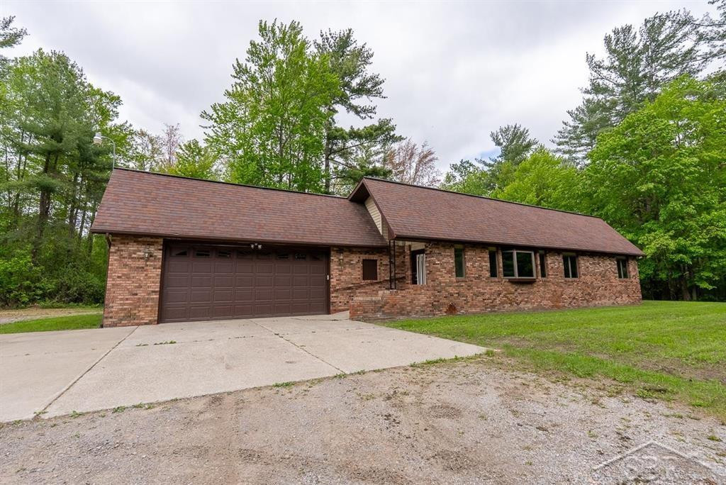 6568 N Sandy Ridge Drive, Hope, MI 48628 — front exterior