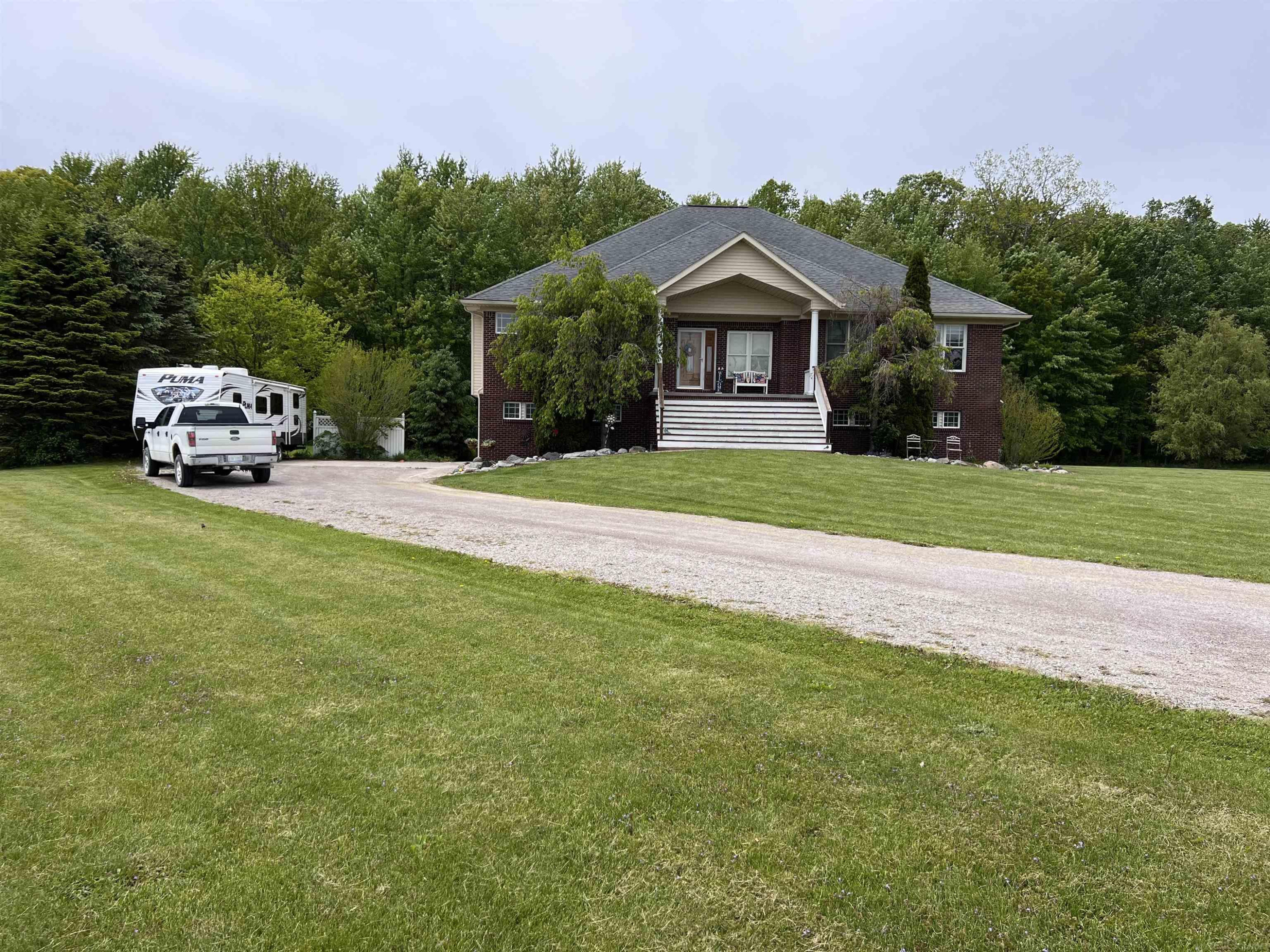 815 Cove Road, Wales, MI — front exterior