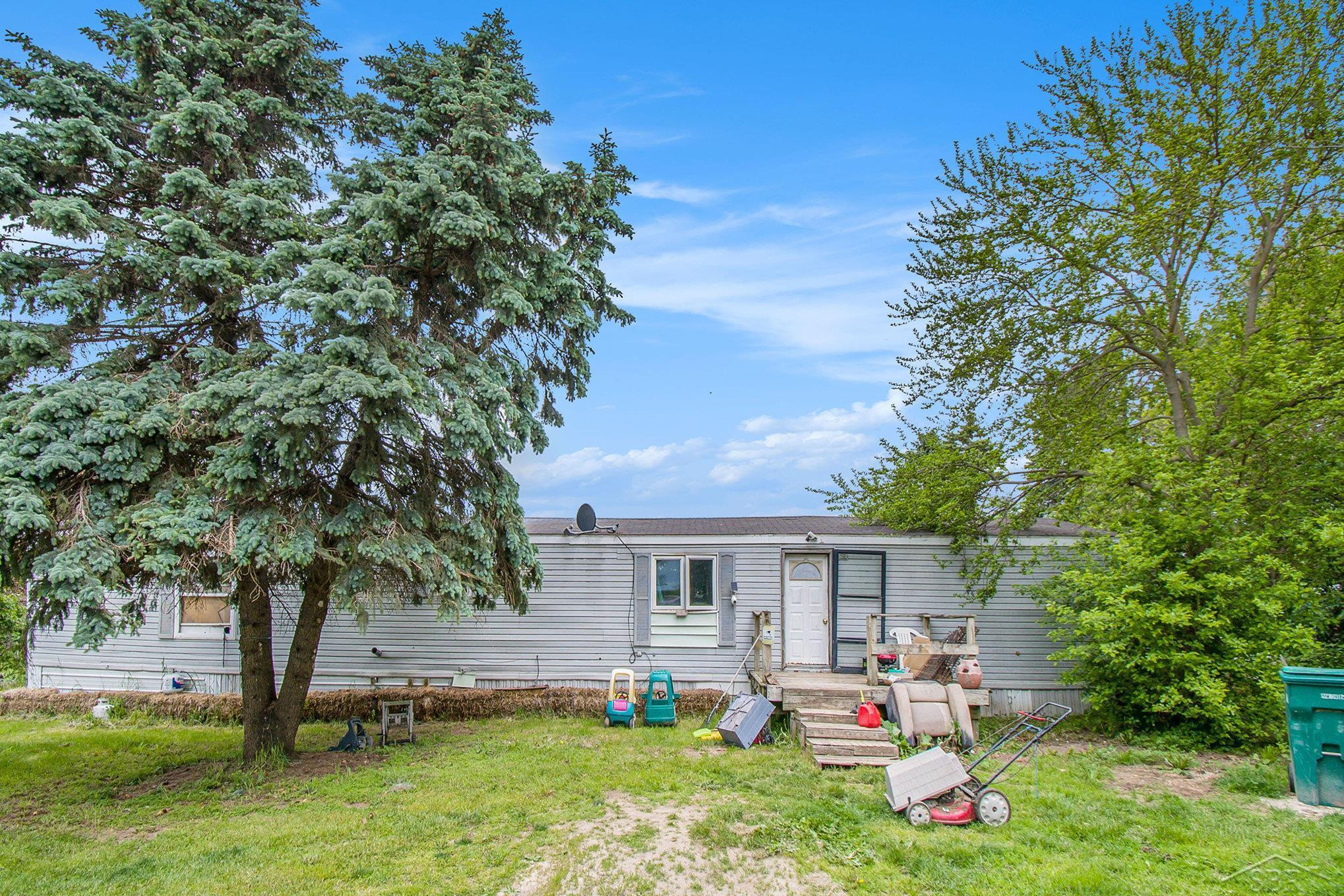 8305 Goodwin Road, Lyons, MI 48851 — front exterior