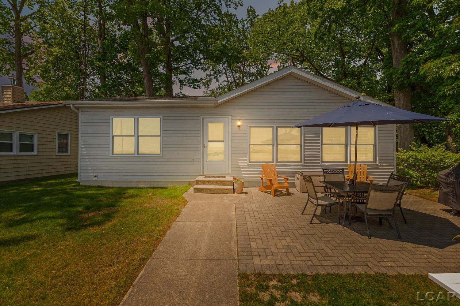 8400 Horton Beach Drive, Manitou Beach, MI 49253 — front exterior