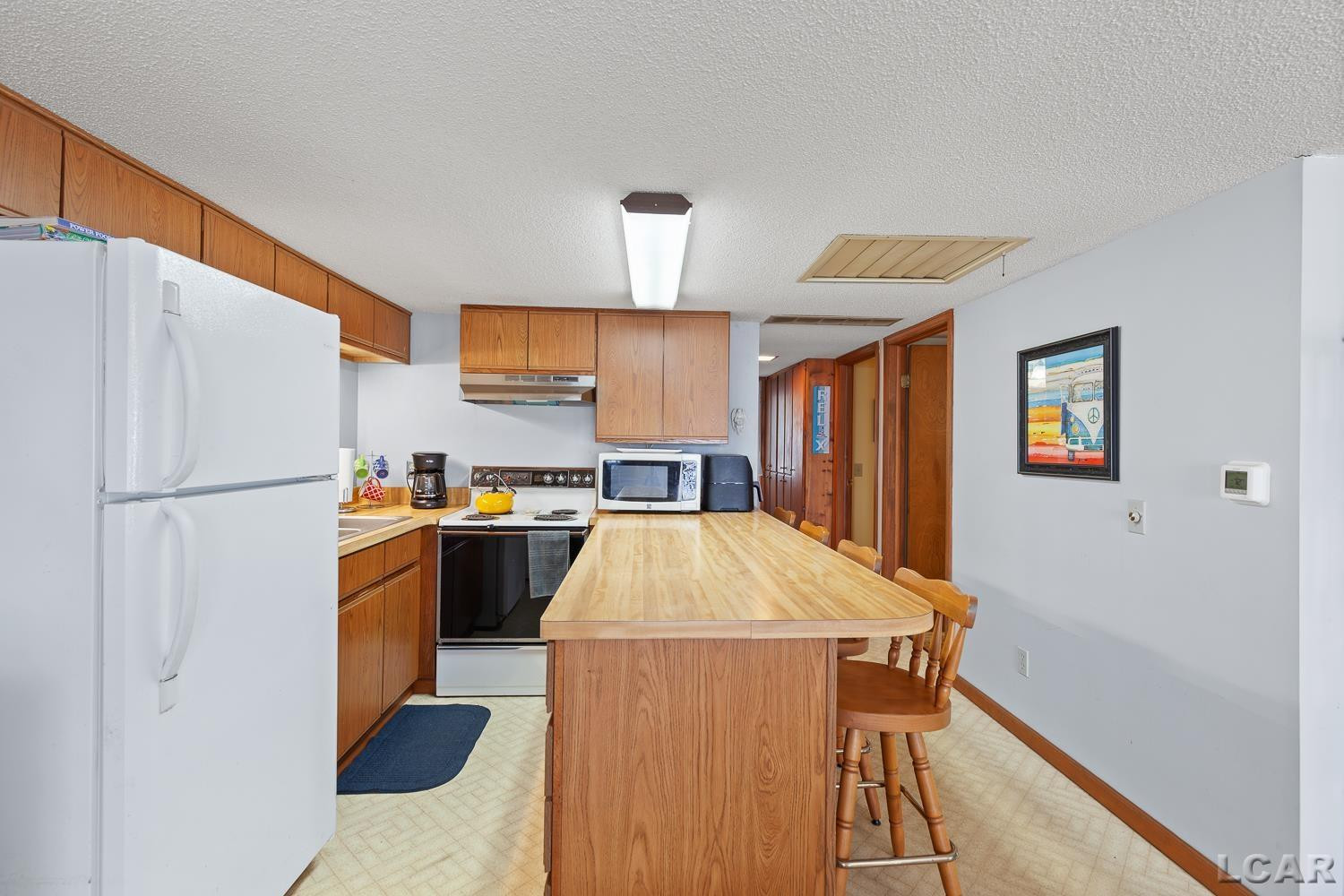 8400 Horton Beach Drive, Manitou Beach, MI 49253 — Photo 16