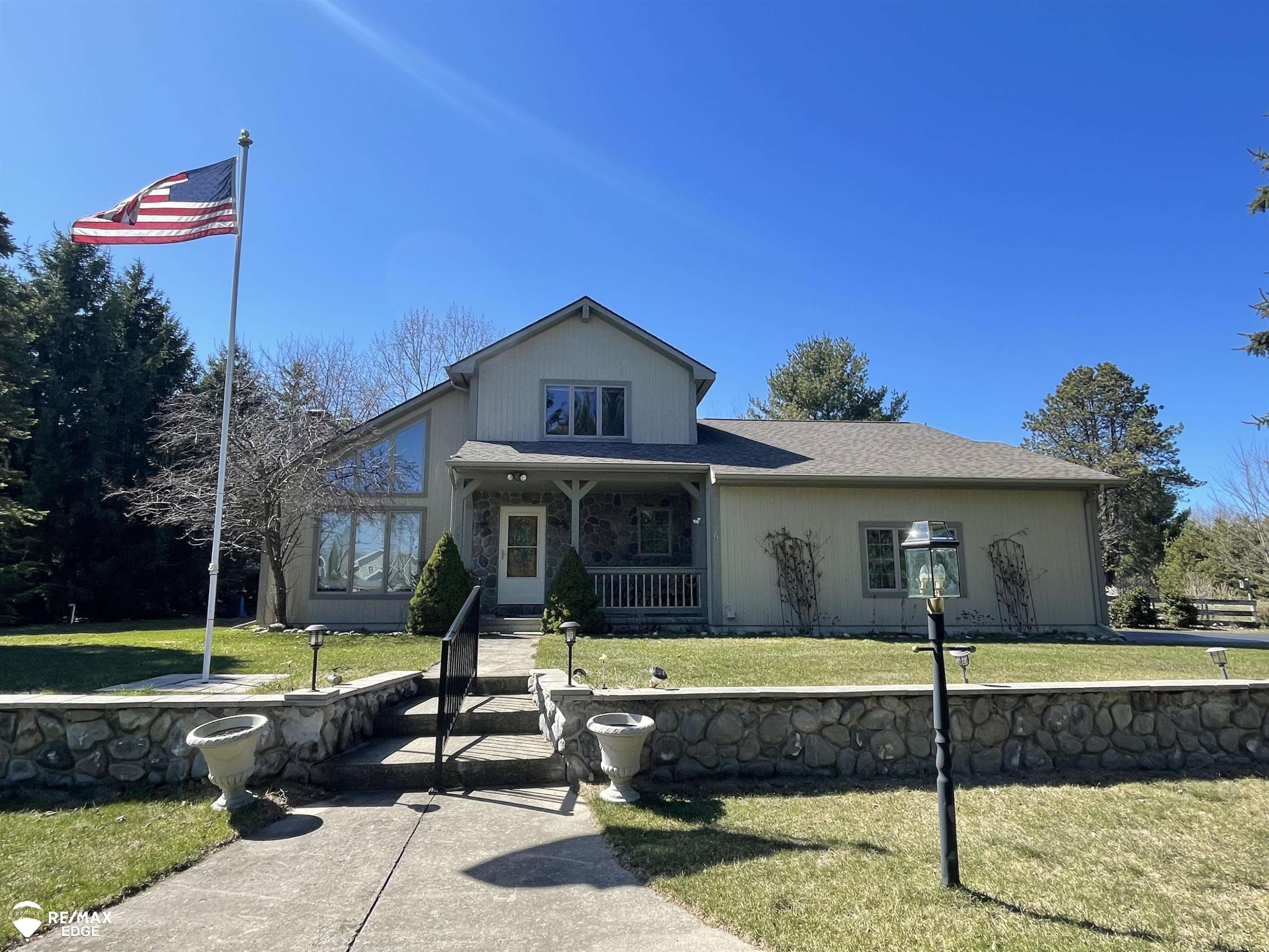 1950 Sunrise Drive, Harrisville, MI 48738 — front exterior