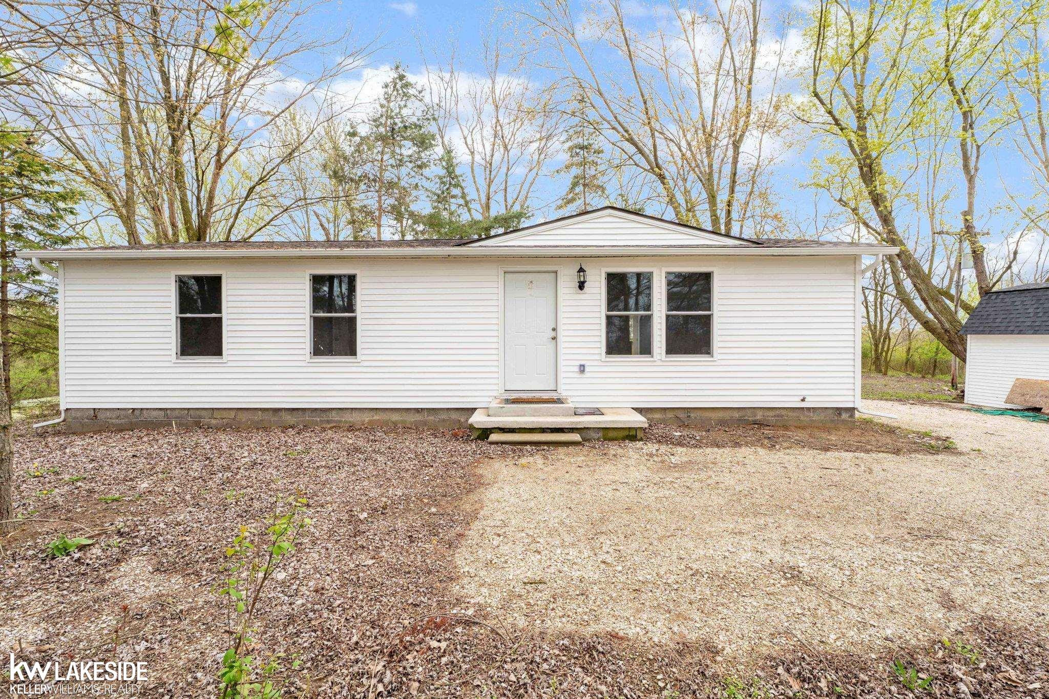 11897 Masters Road, MI — front exterior