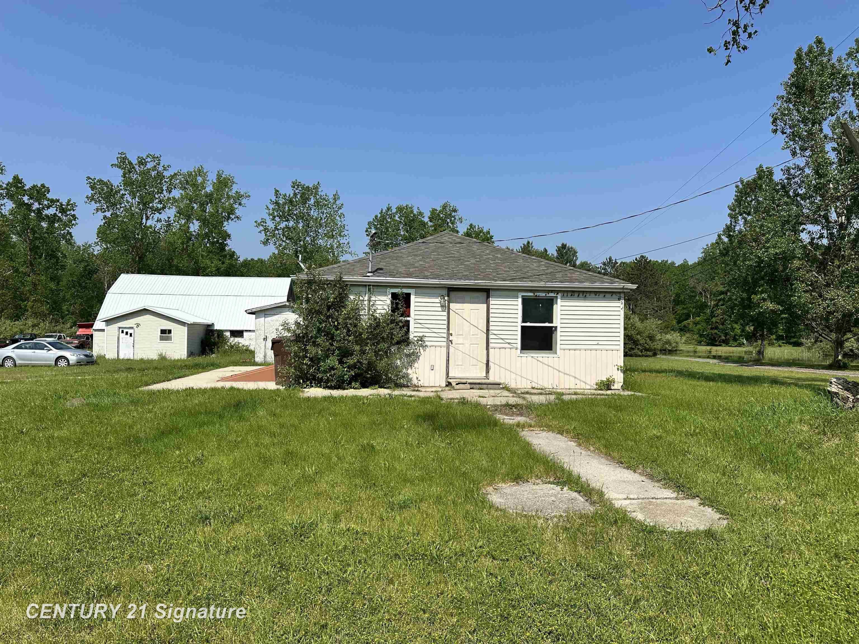 2252 N M-18 Road, Beaverton, MI 48612 — front exterior