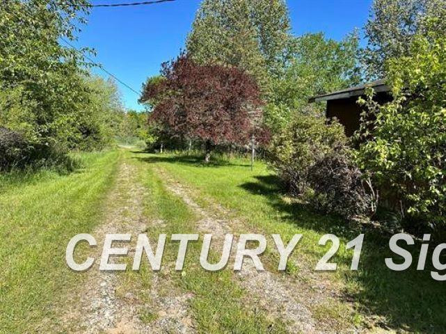 605 N Poor Farm Road, Harrisville, MI 48740 — Photo 22