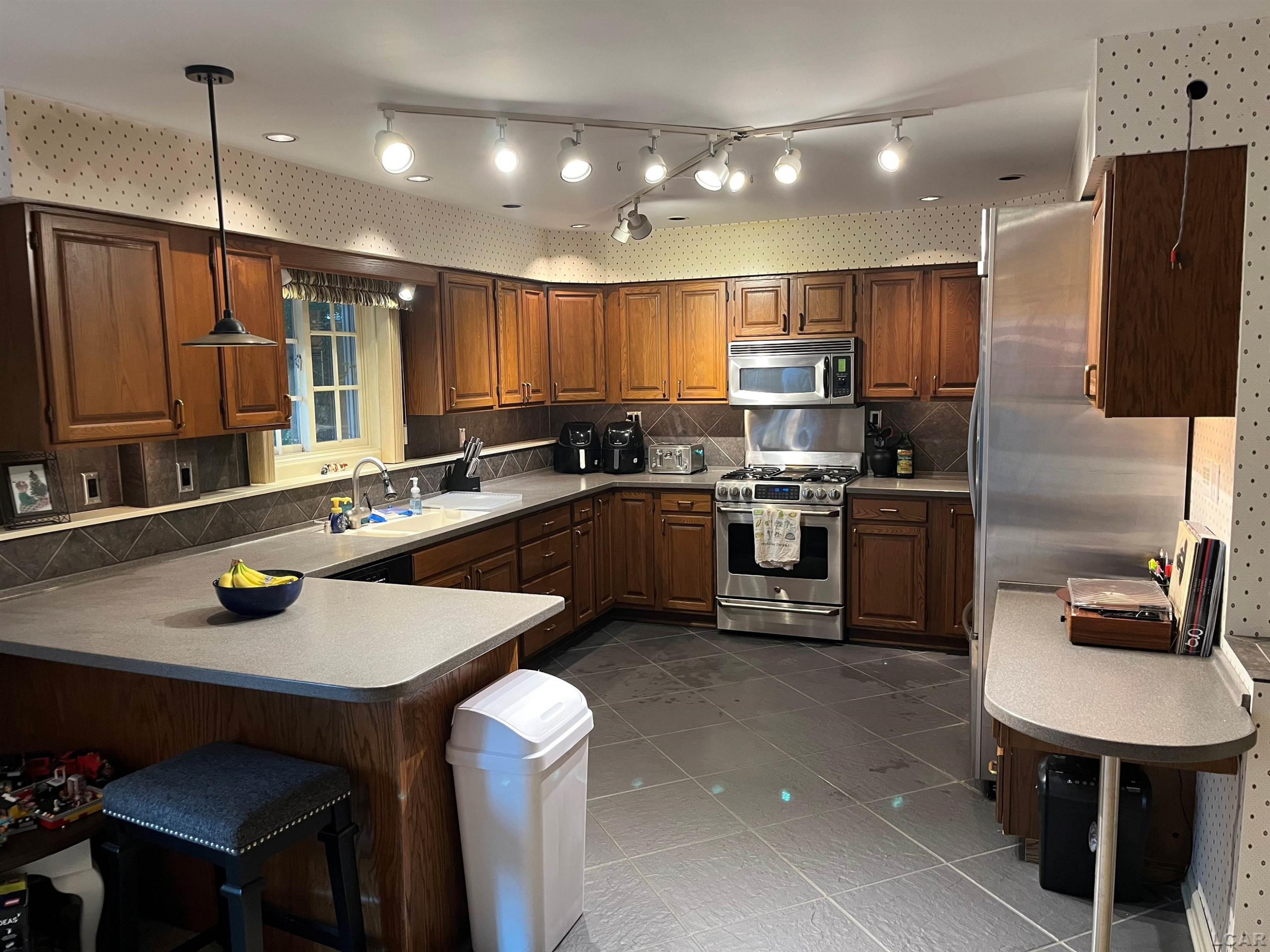 516 River Pointe Circle, Milan, MI — Photo 3