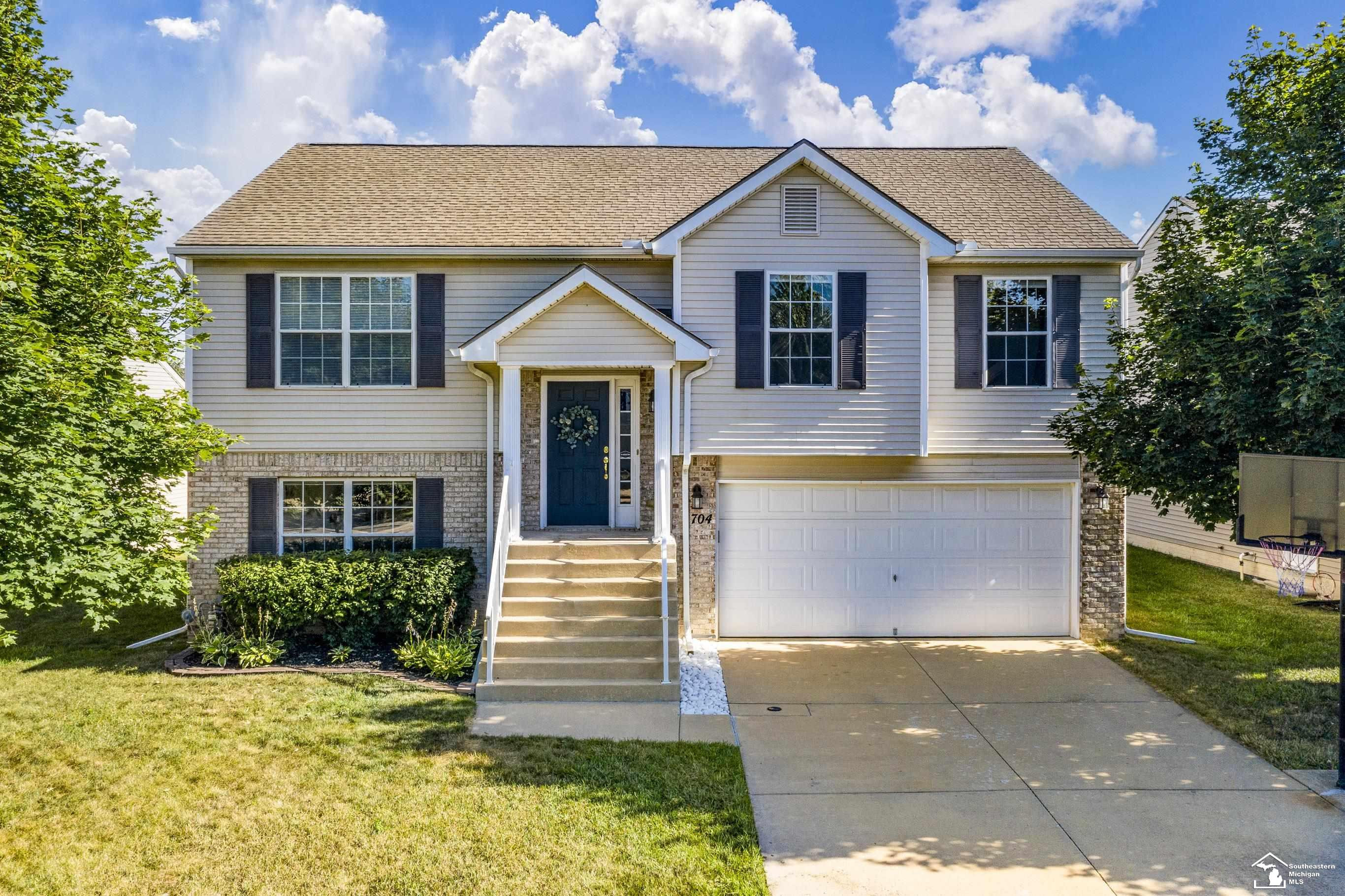 704 Arbor Chase Drive, Dundee, MI 48131 — front exterior