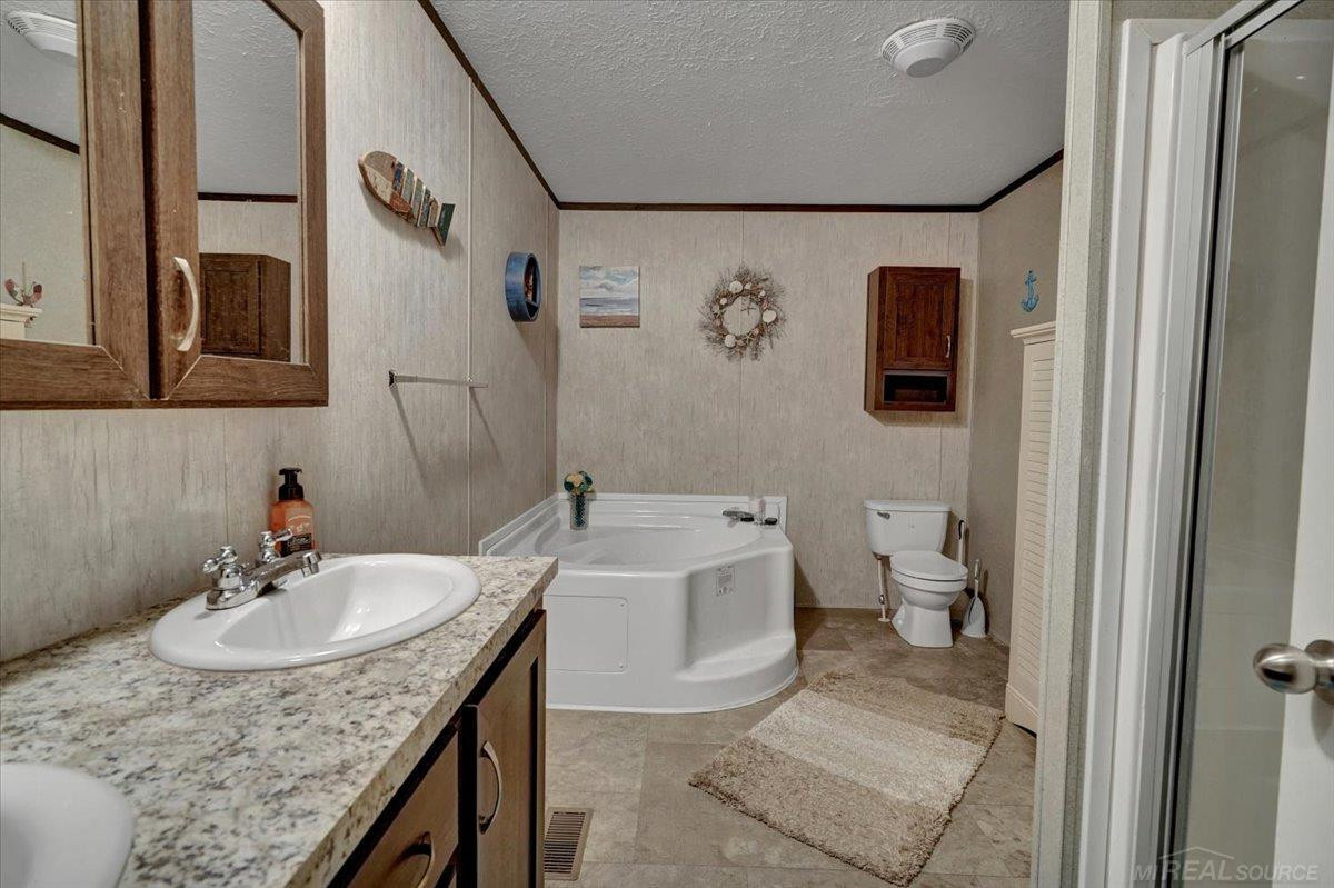 9608 Stoneypointe Drive, 129, MI — Photo 19
