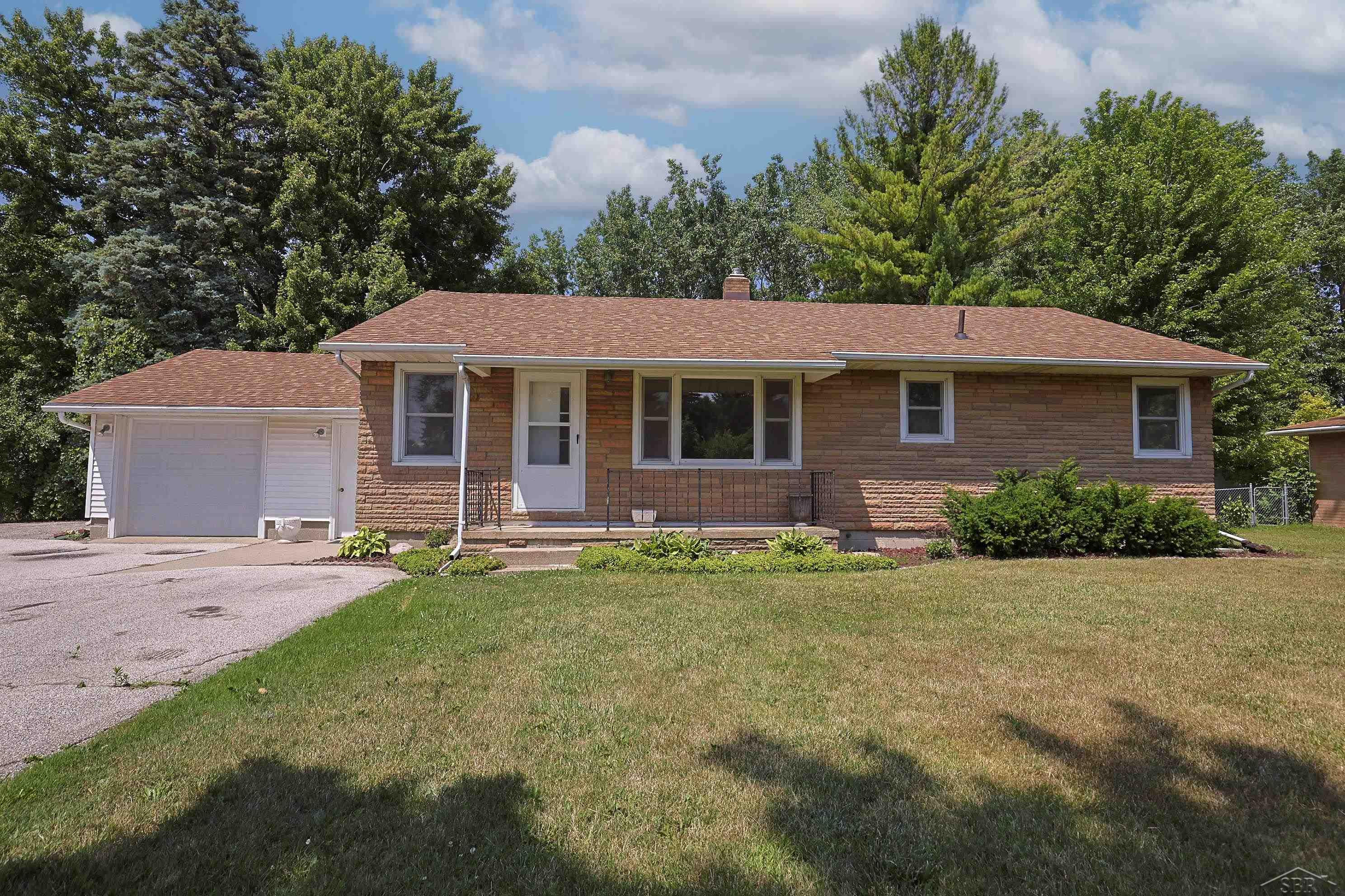 1944 W Midland Road, Auburn, MI 48611 — front exterior