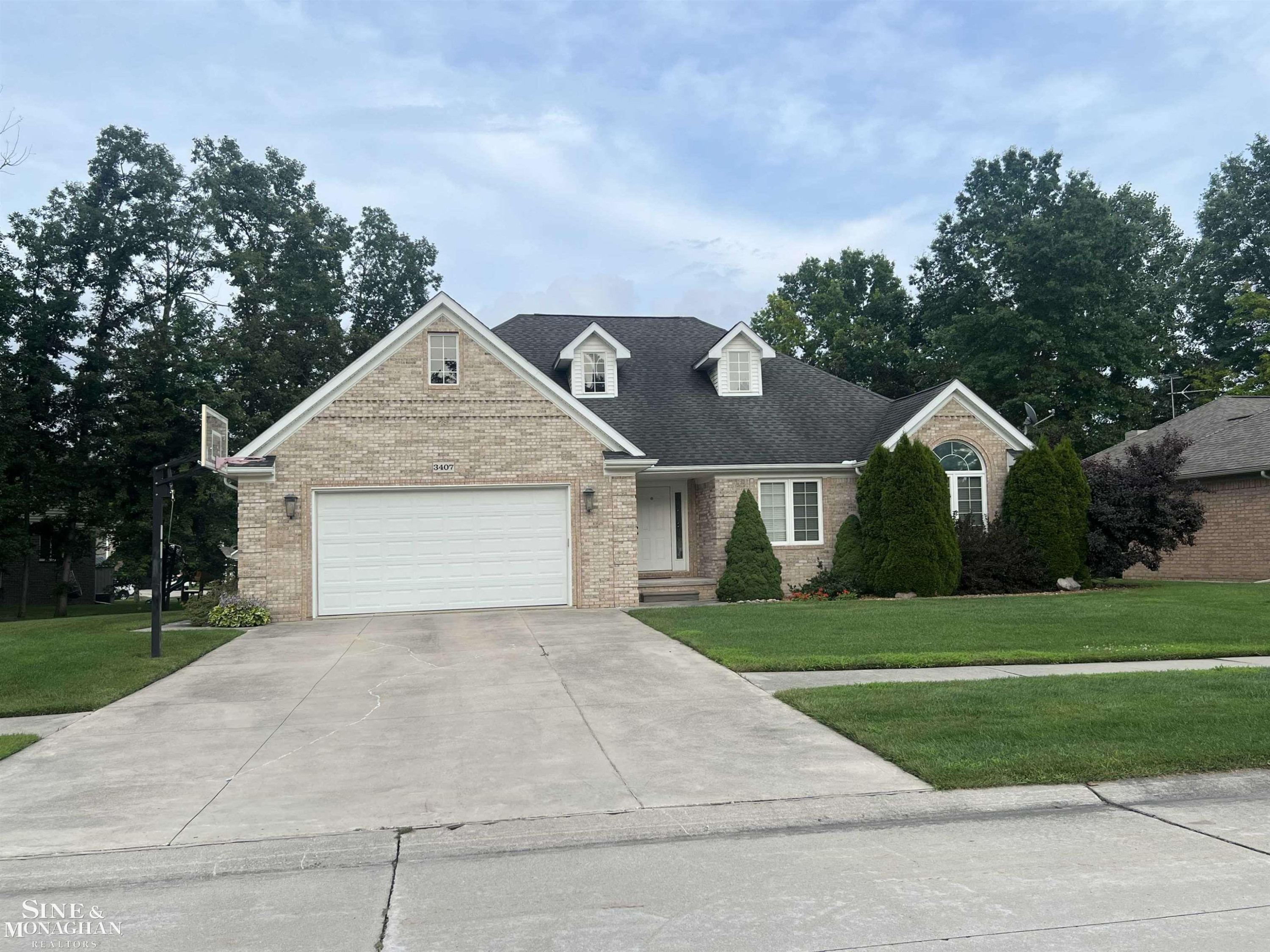 3407 Round Tree Drive, MI — front exterior