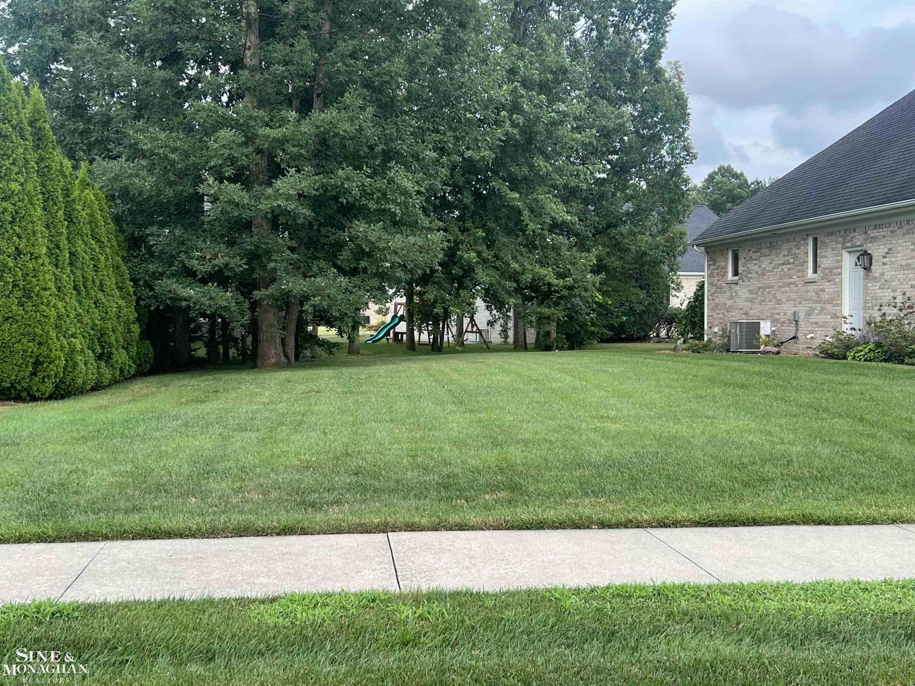3407 Round Tree Drive, MI — Photo 2