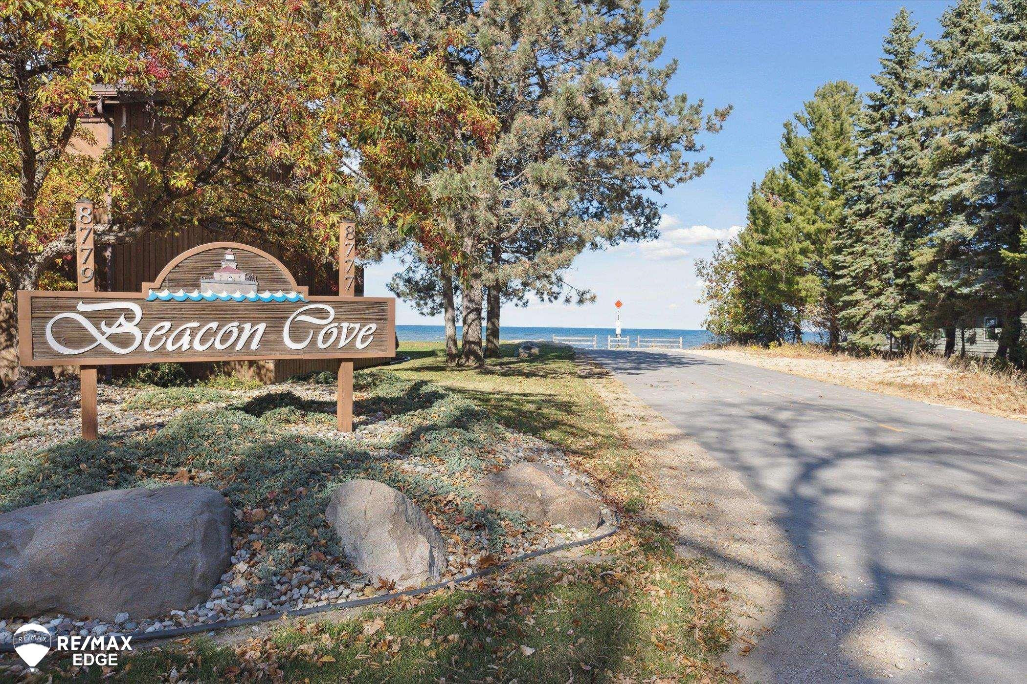 8779 Larned Road, 21, Port Austin, MI 48467 — front exterior