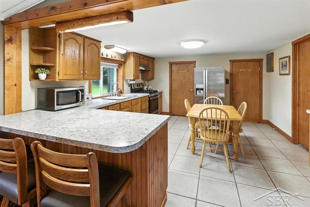486 W Woodland Drive, Sanford, MI 48657 — Photo 9