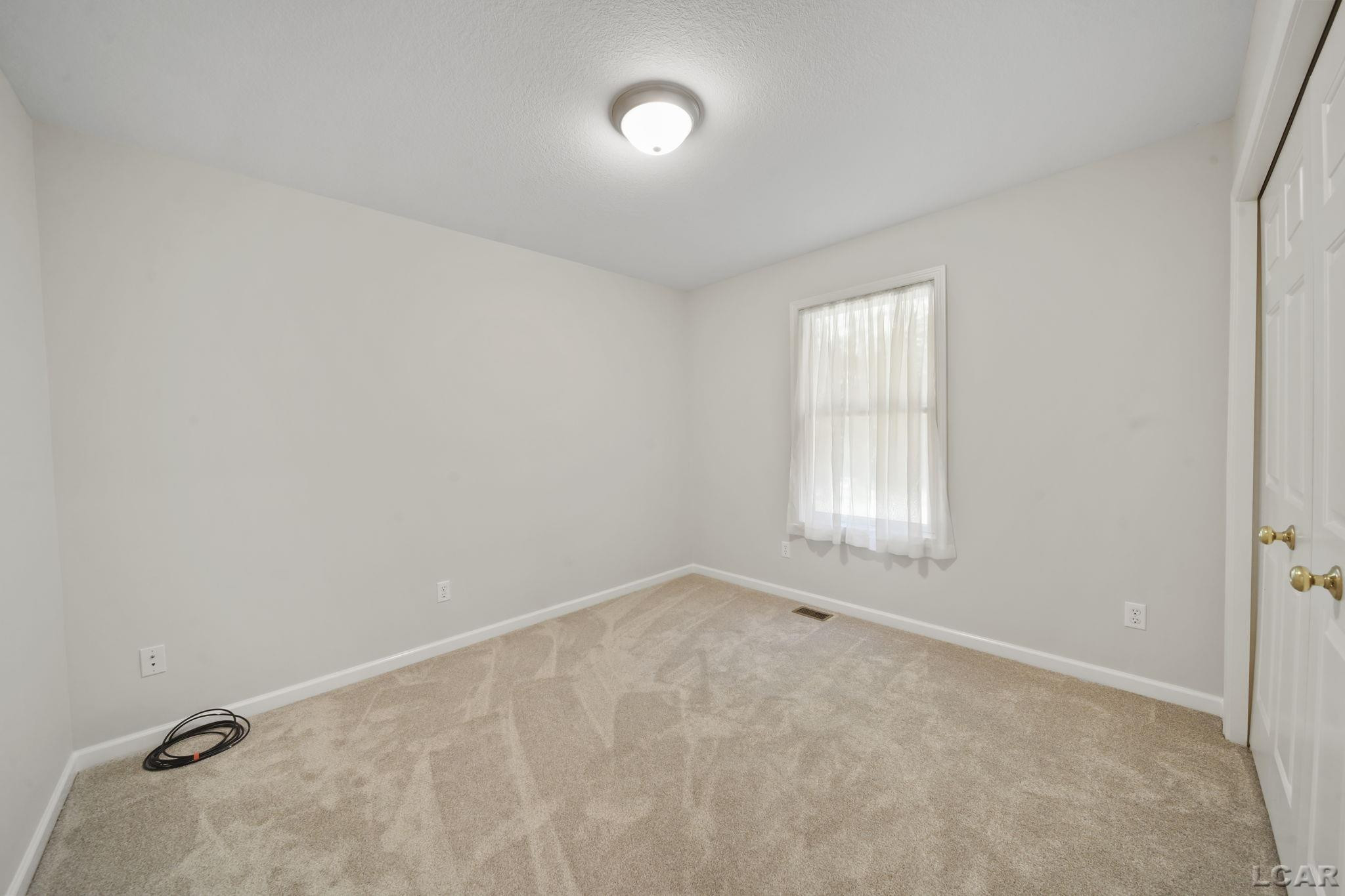 1692 Rivers Edge Court, Adrian, MI 49221 — Photo 9