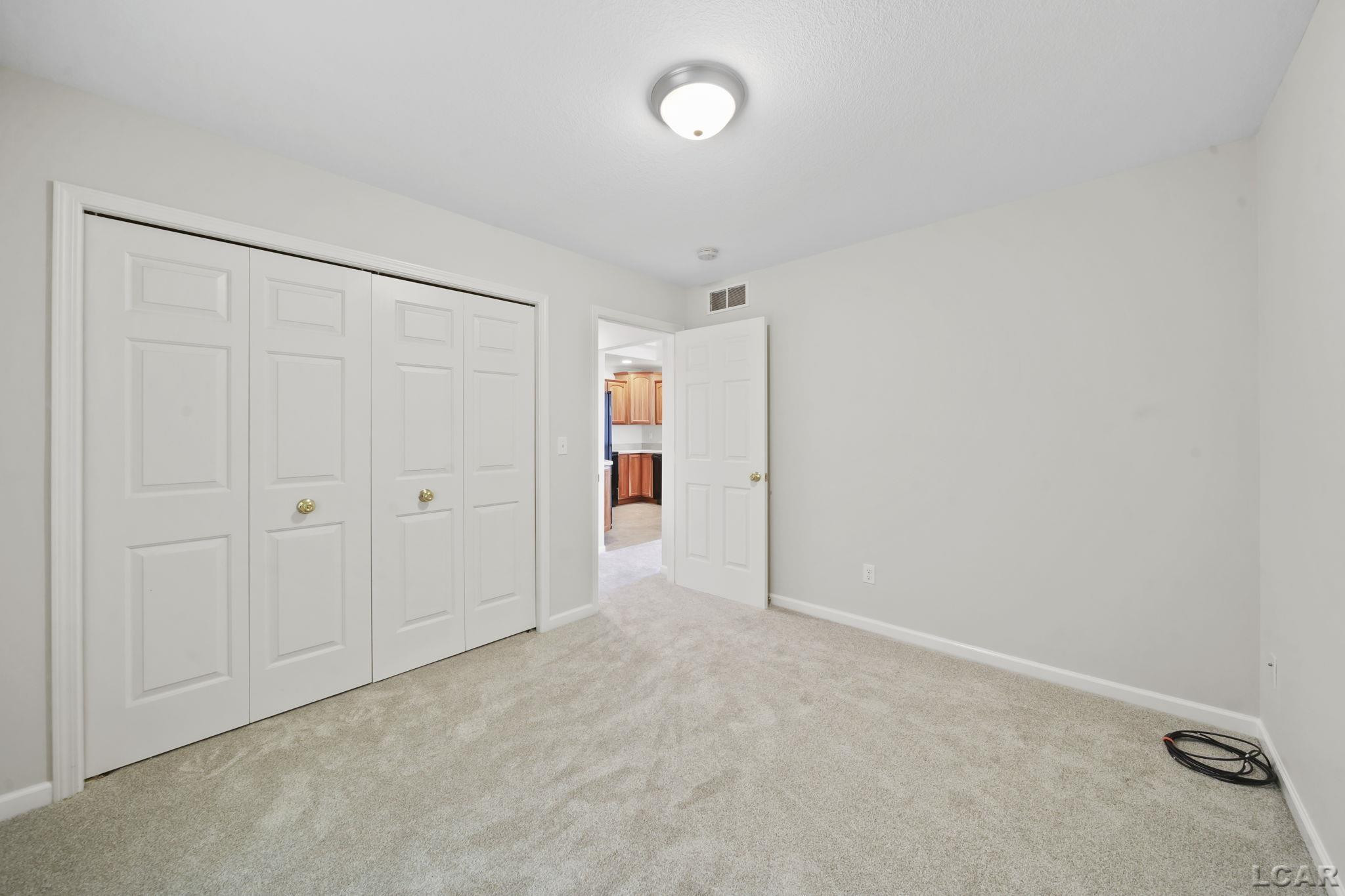 1692 Rivers Edge Court, Adrian, MI 49221 — Photo 10