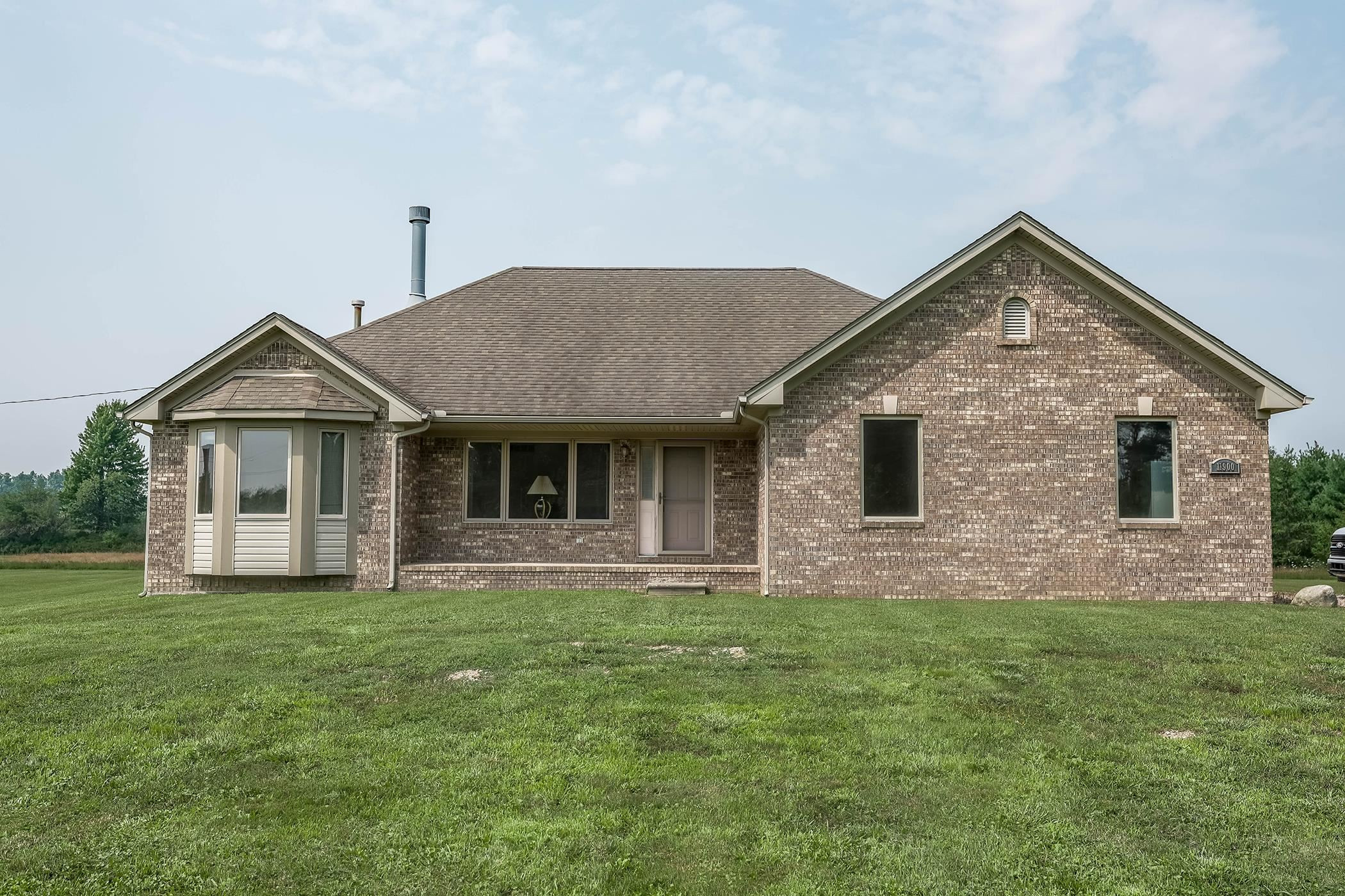 11900 Dunn Rd Street, MI — front exterior