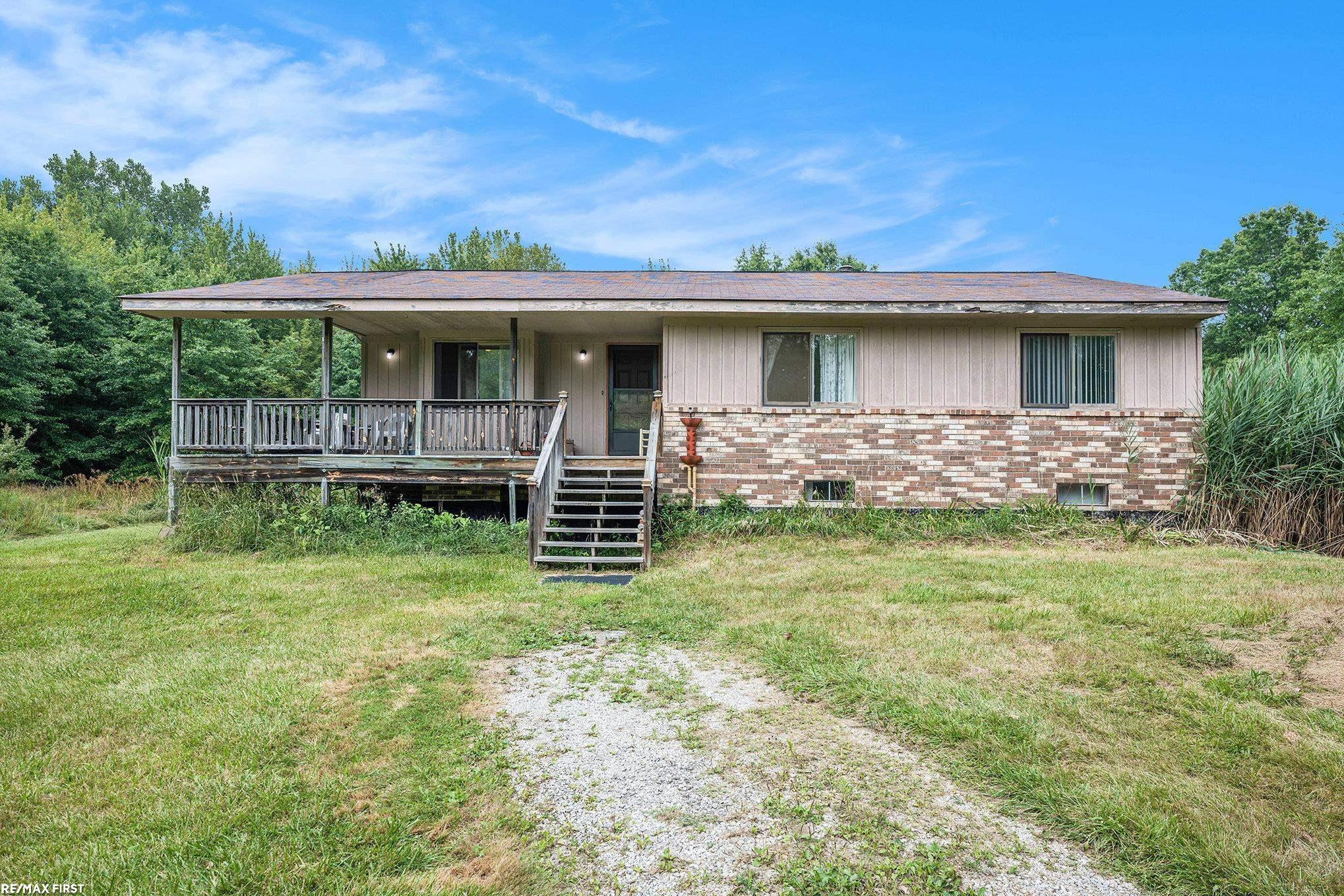 7758 Puttygut Road, MI 48064 — front exterior
